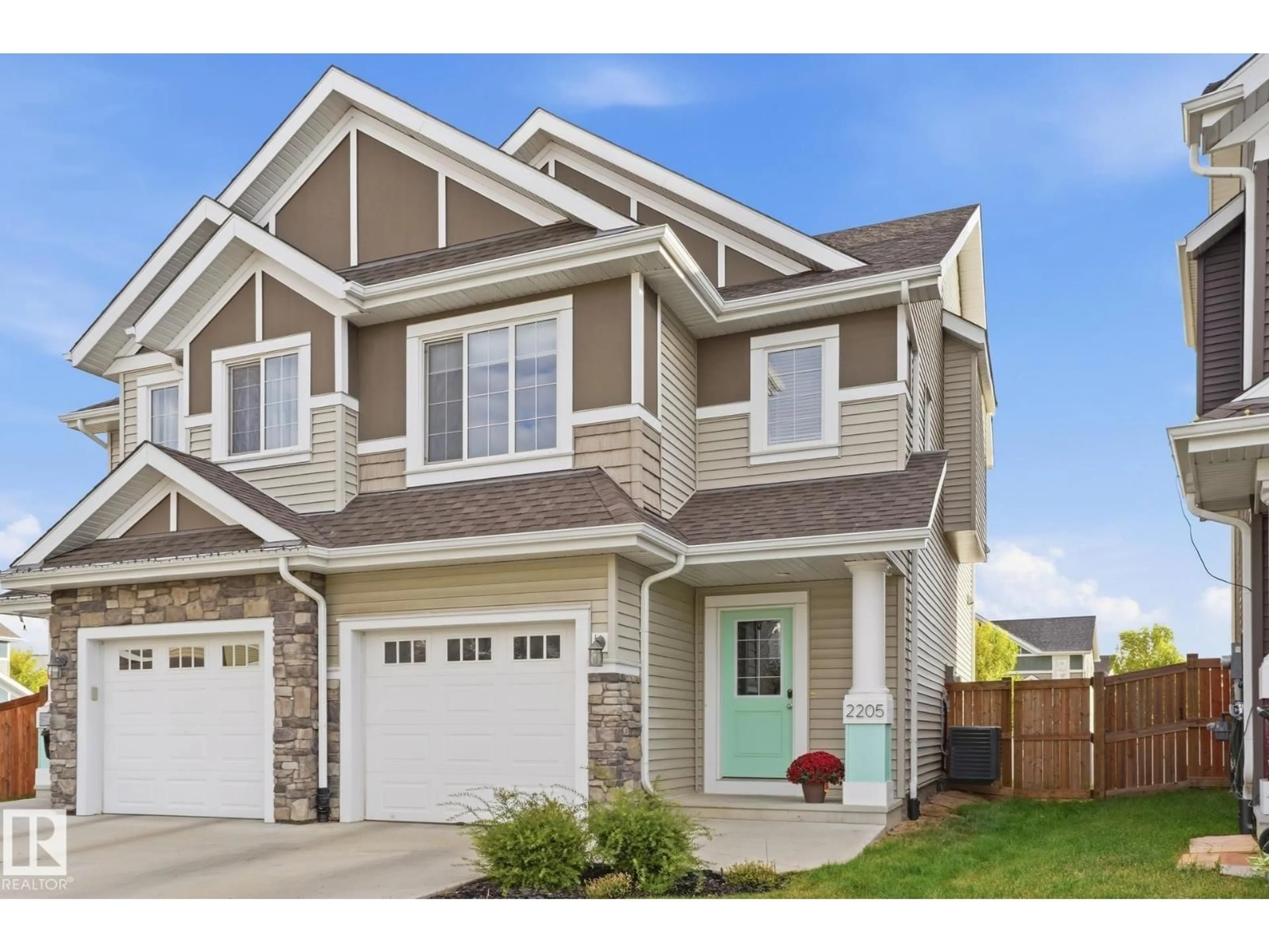 Home with vinyl exterior material, street for SW - 2205 82 ST, Edmonton Alberta T6X2J6