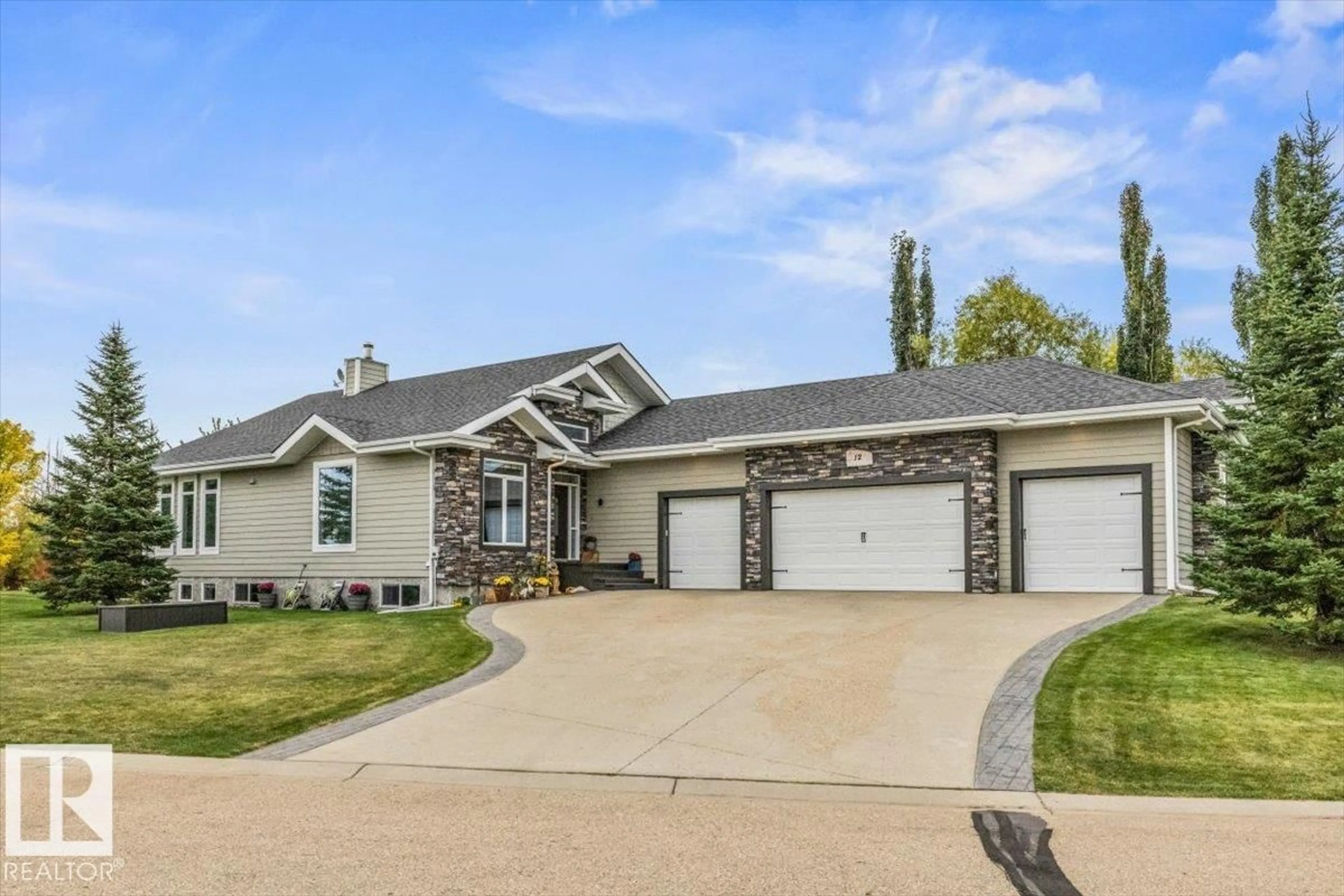 Home with vinyl exterior material, street for 12 51025 RGE ROAD 222, Rural Strathcona County Alberta T8C1J5