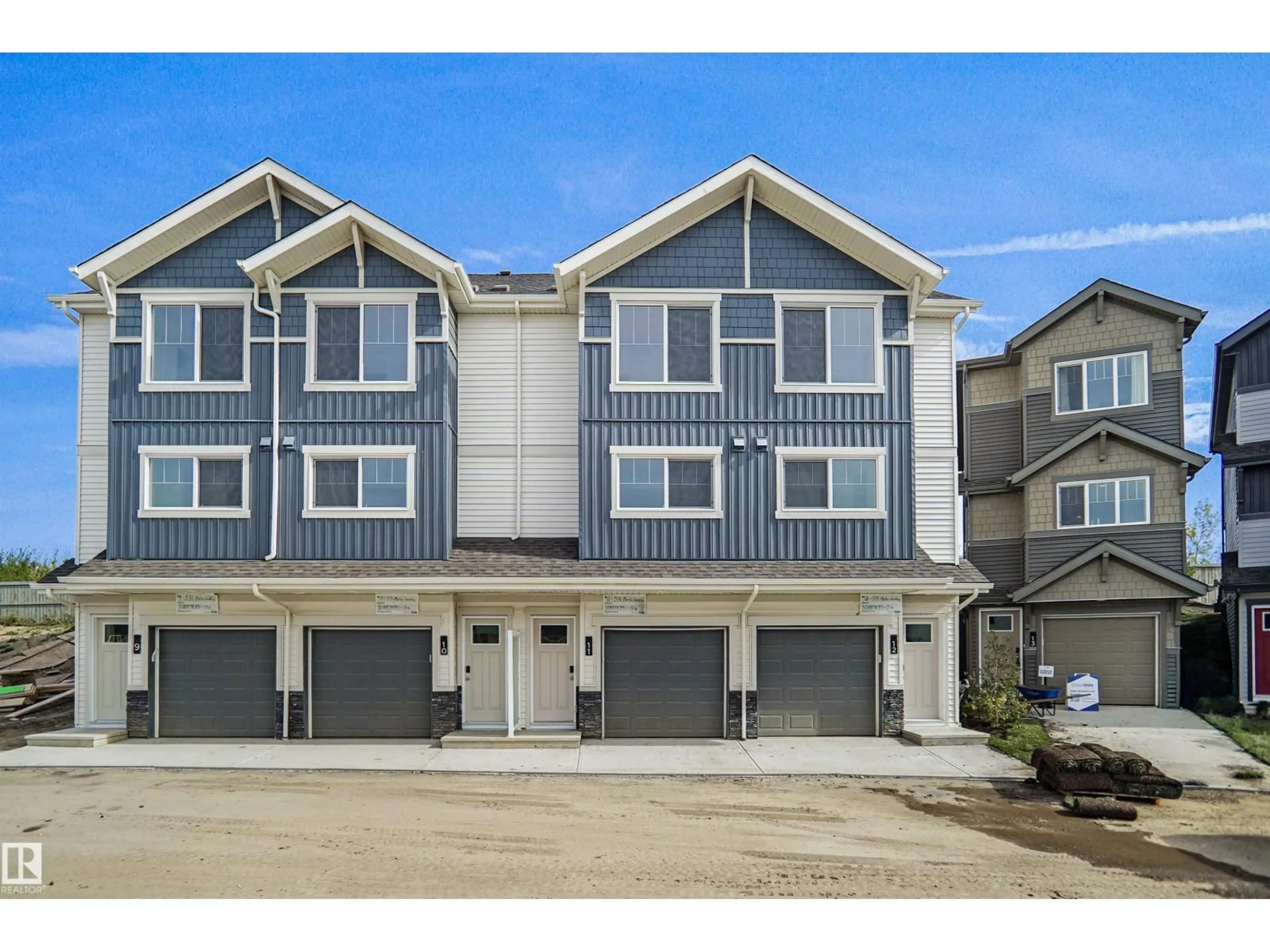 Home with vinyl exterior material, street for #31 - 531 MERLIN LANDING LD, Edmonton Alberta T5S0L9