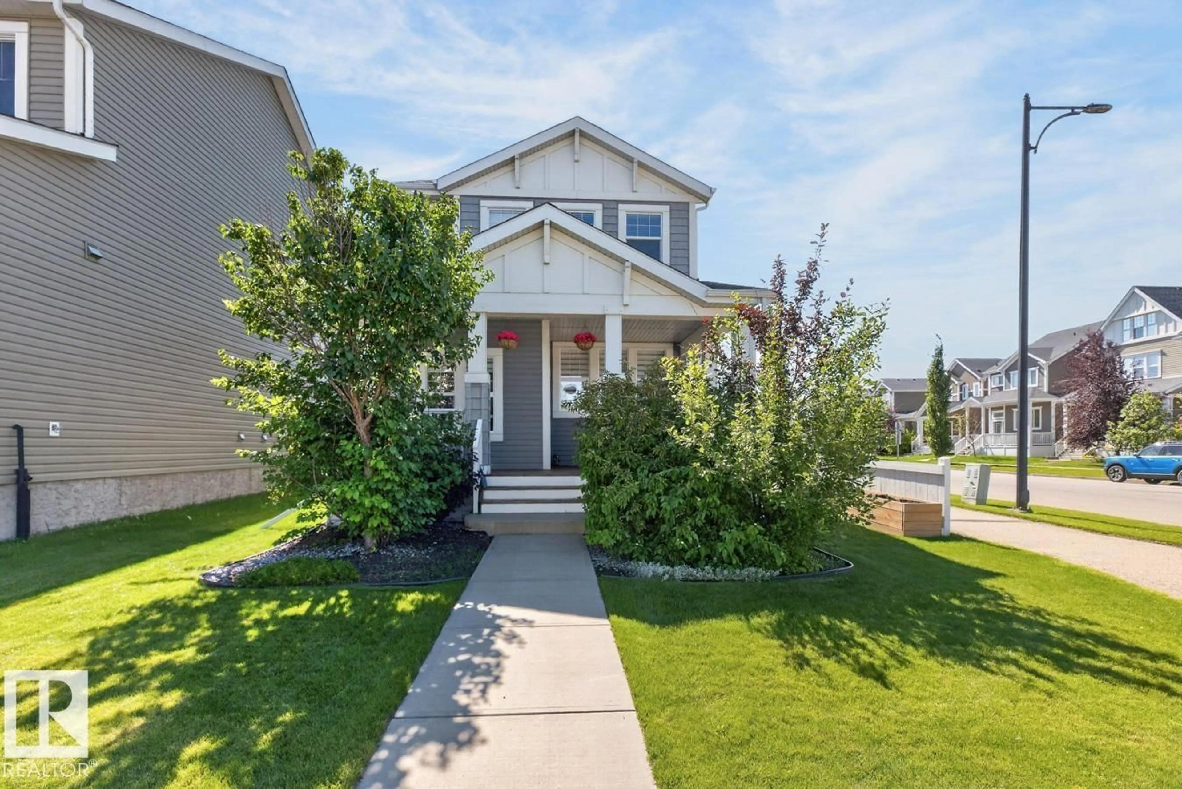 Home with vinyl exterior material, street for 424 SIMMONDS WY, Leduc Alberta T9E0E6