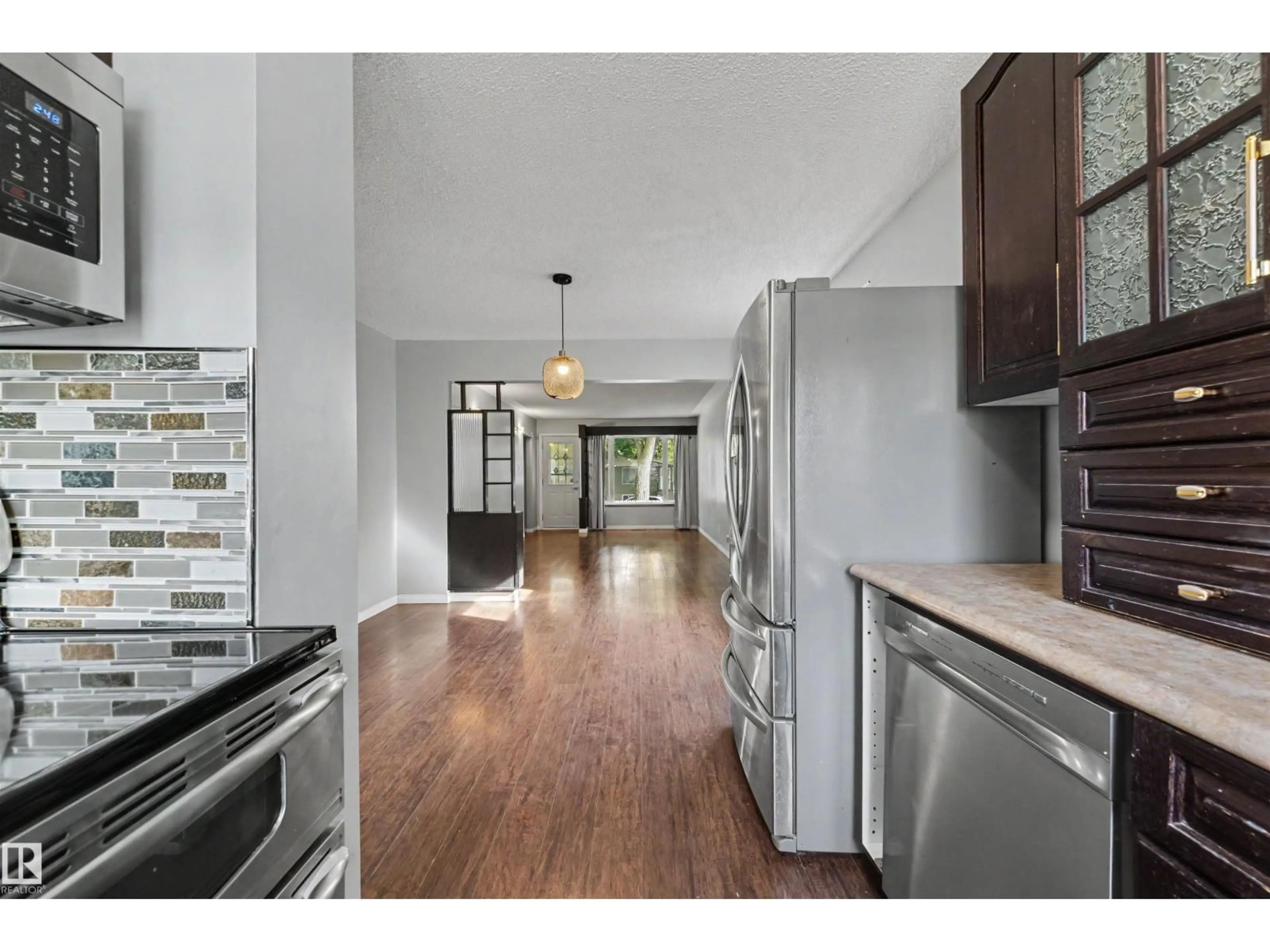 Open concept kitchen, unknown for NW - 12944 117 ST, Edmonton Alberta T5E5J7