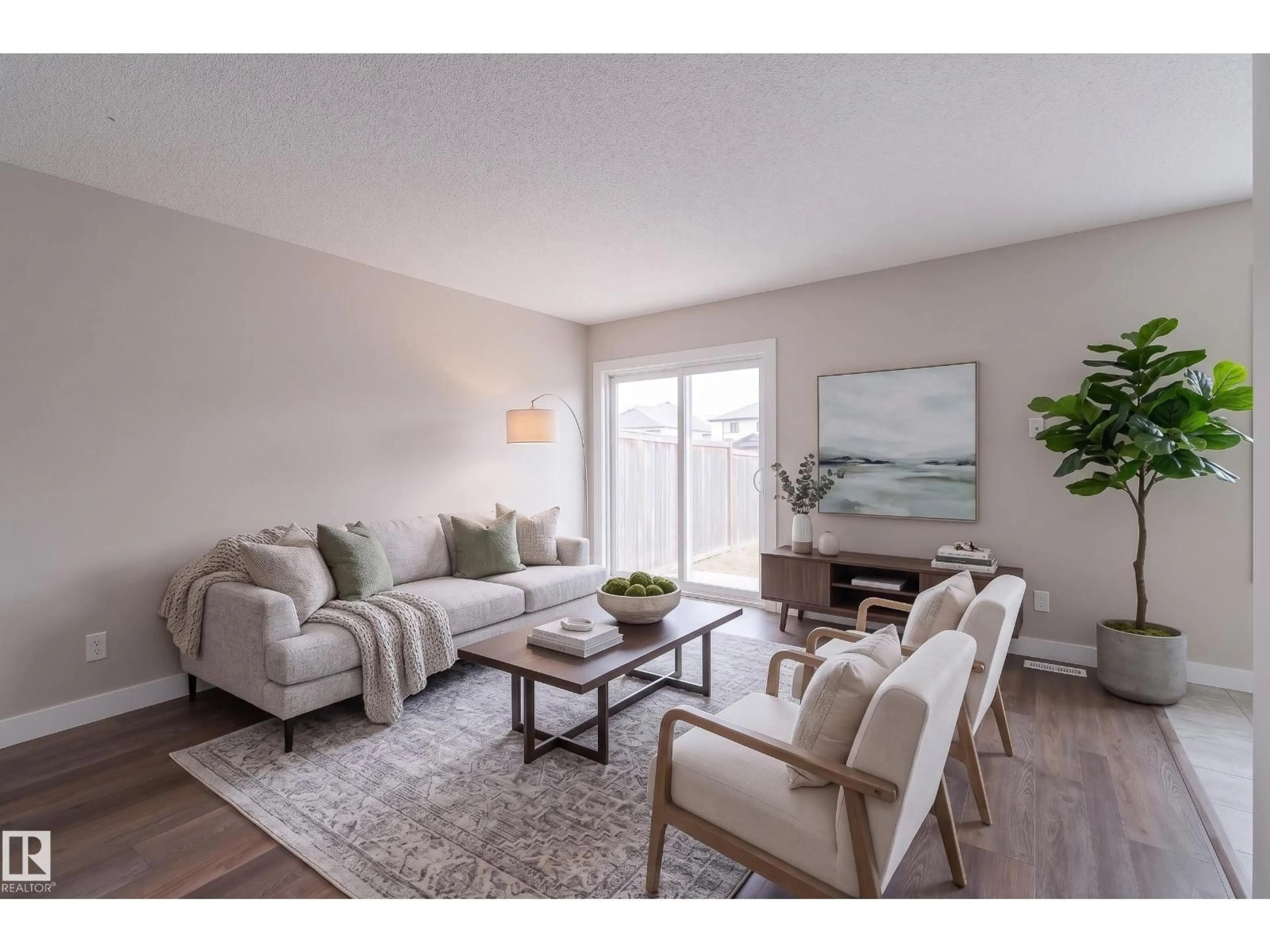 Living room with furniture, wood/laminate floor for NW - 149 CORNELL CO, Edmonton Alberta T5C3C3
