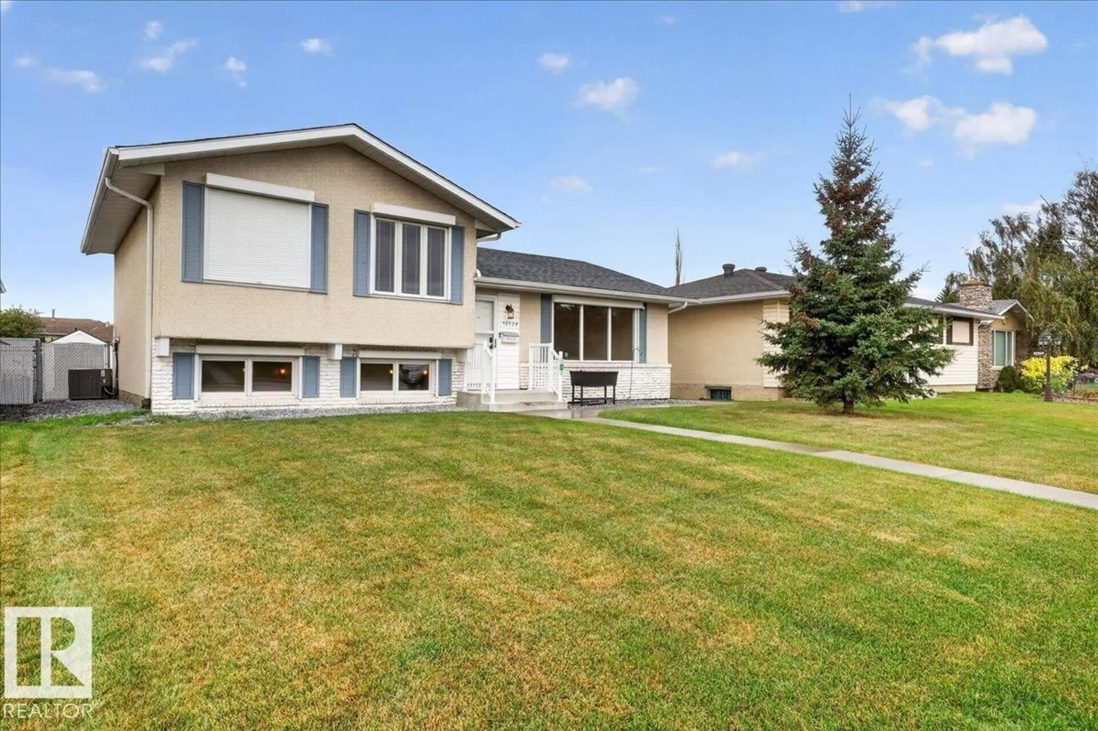 Home with vinyl exterior material, street for NW - 15128 88 ST, Edmonton Alberta T5E5T5