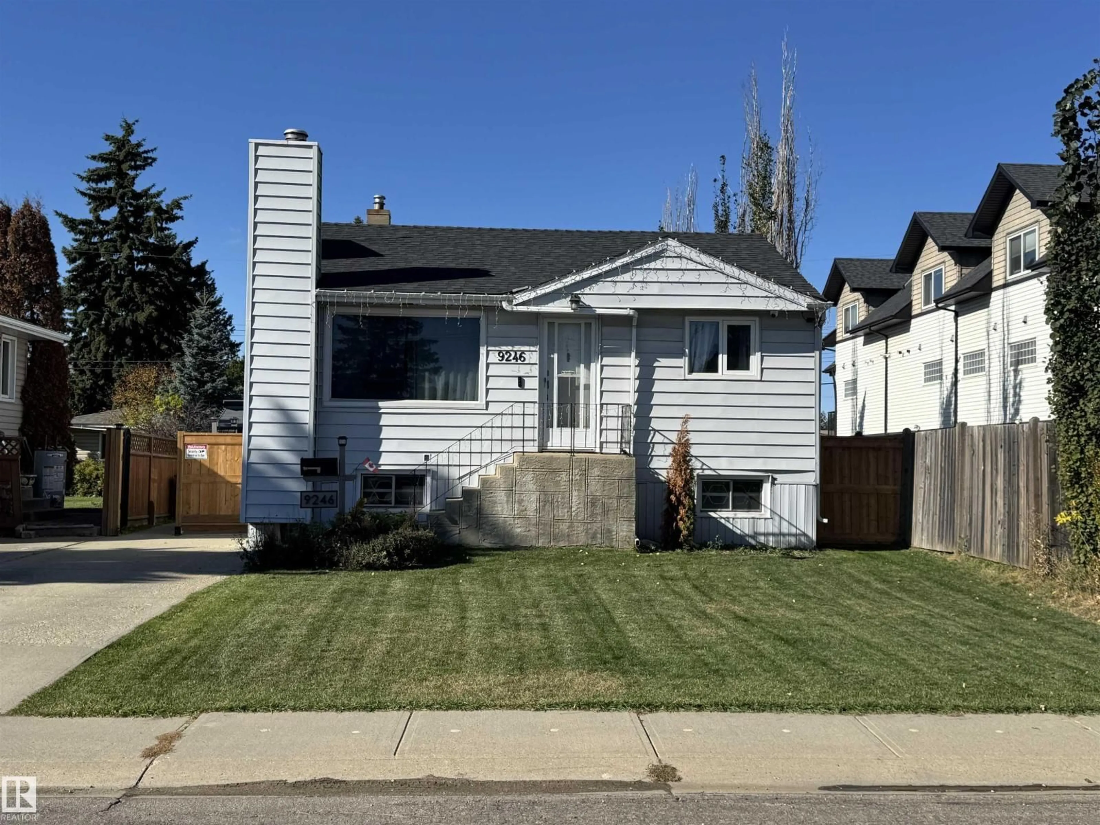 Home with vinyl exterior material, street for NW - 9246 154 ST, Edmonton Alberta T5R1T5