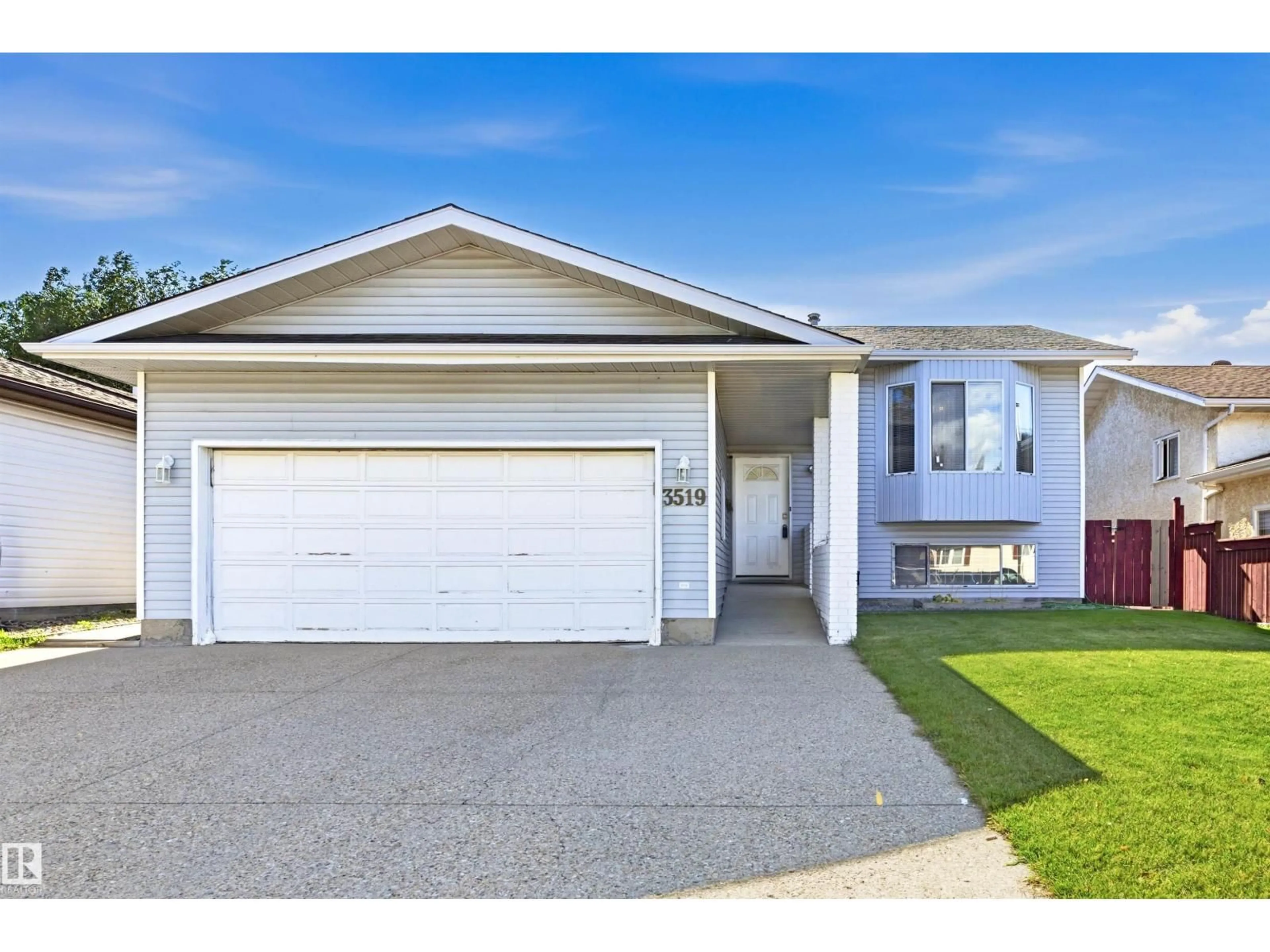 Home with vinyl exterior material, street for 3519 33 AV, Edmonton Alberta T6L4N6