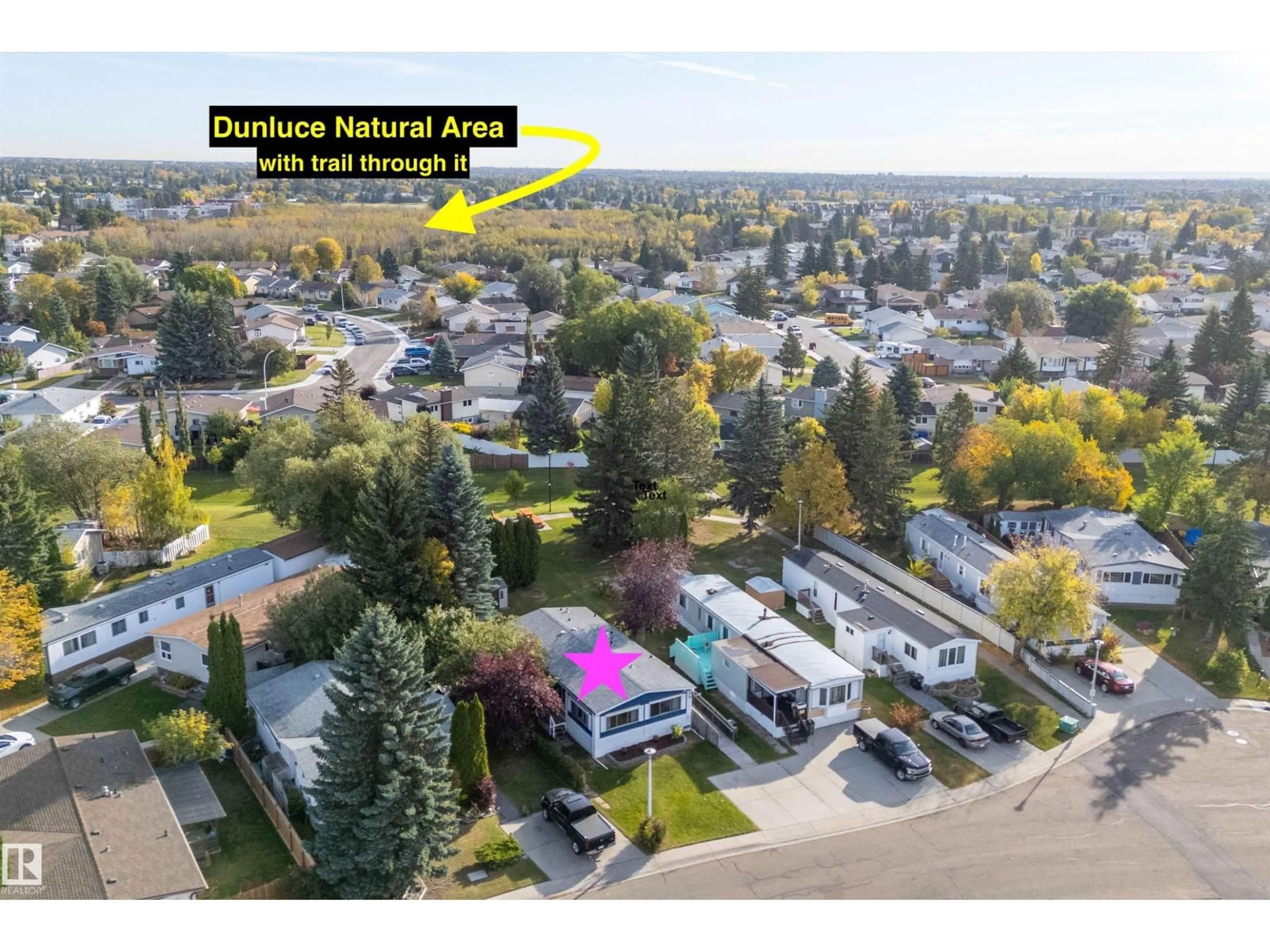 A pic from outside/outdoor area/front of a property/back of a property/a pic from drone, mountain view for 39 12604 153 AV NW, Edmonton Alberta T5X4M7