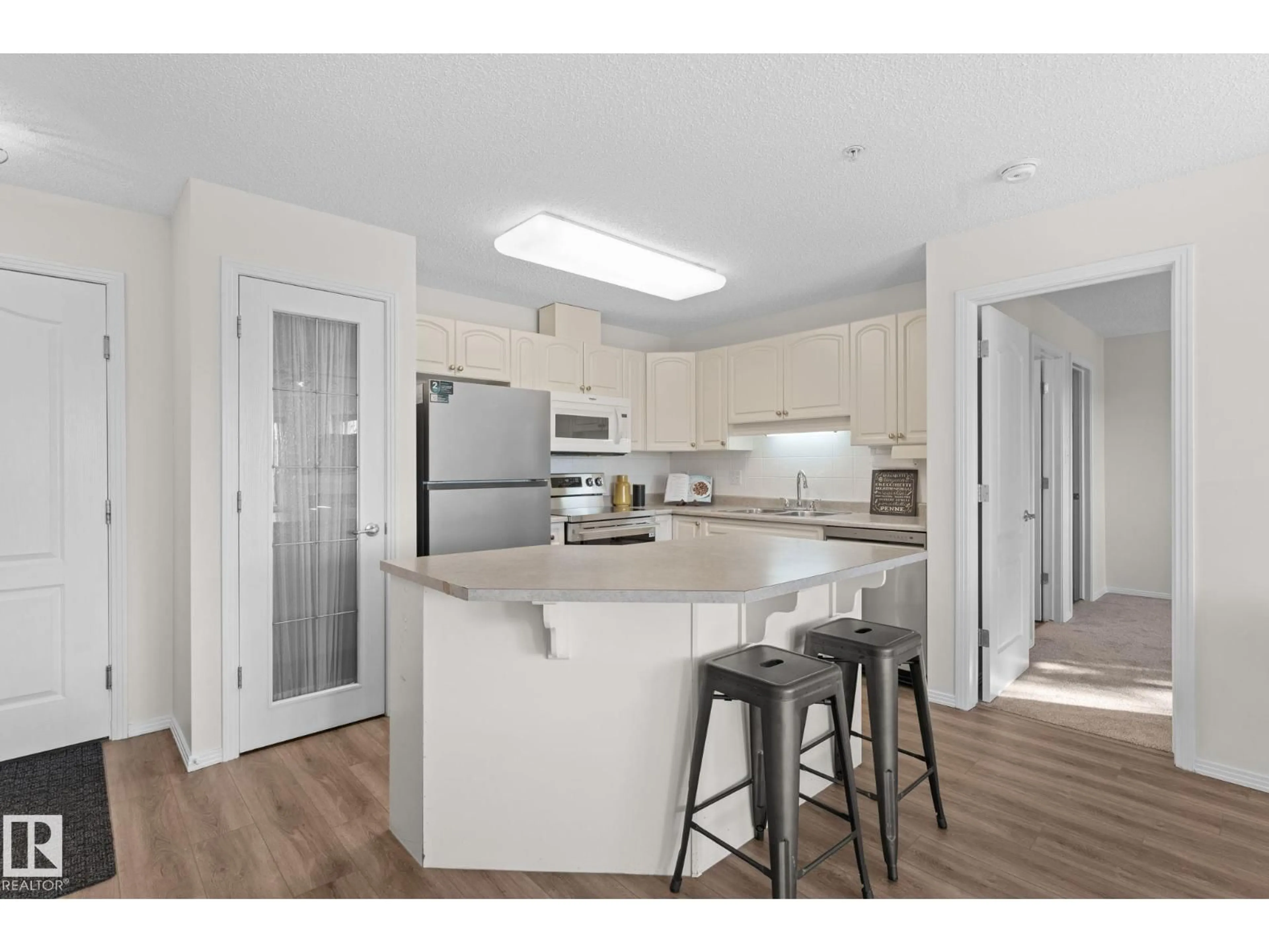 Open concept kitchen, unknown for 207 - 2420 108 ST, Edmonton Alberta T6J7J3