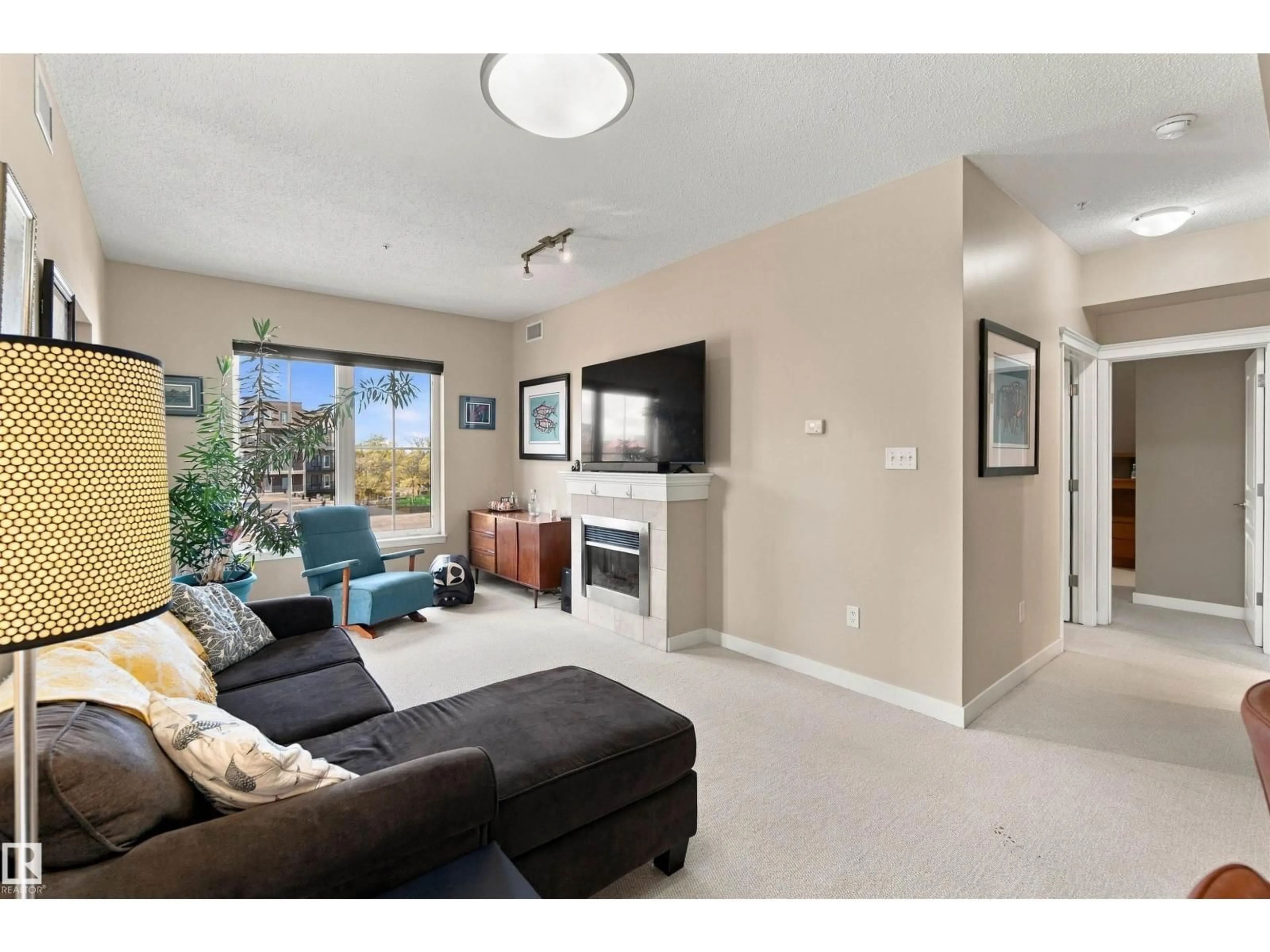 Living room with furniture, unknown for 421 10333 112 ST NW, Edmonton Alberta T5K0B4
