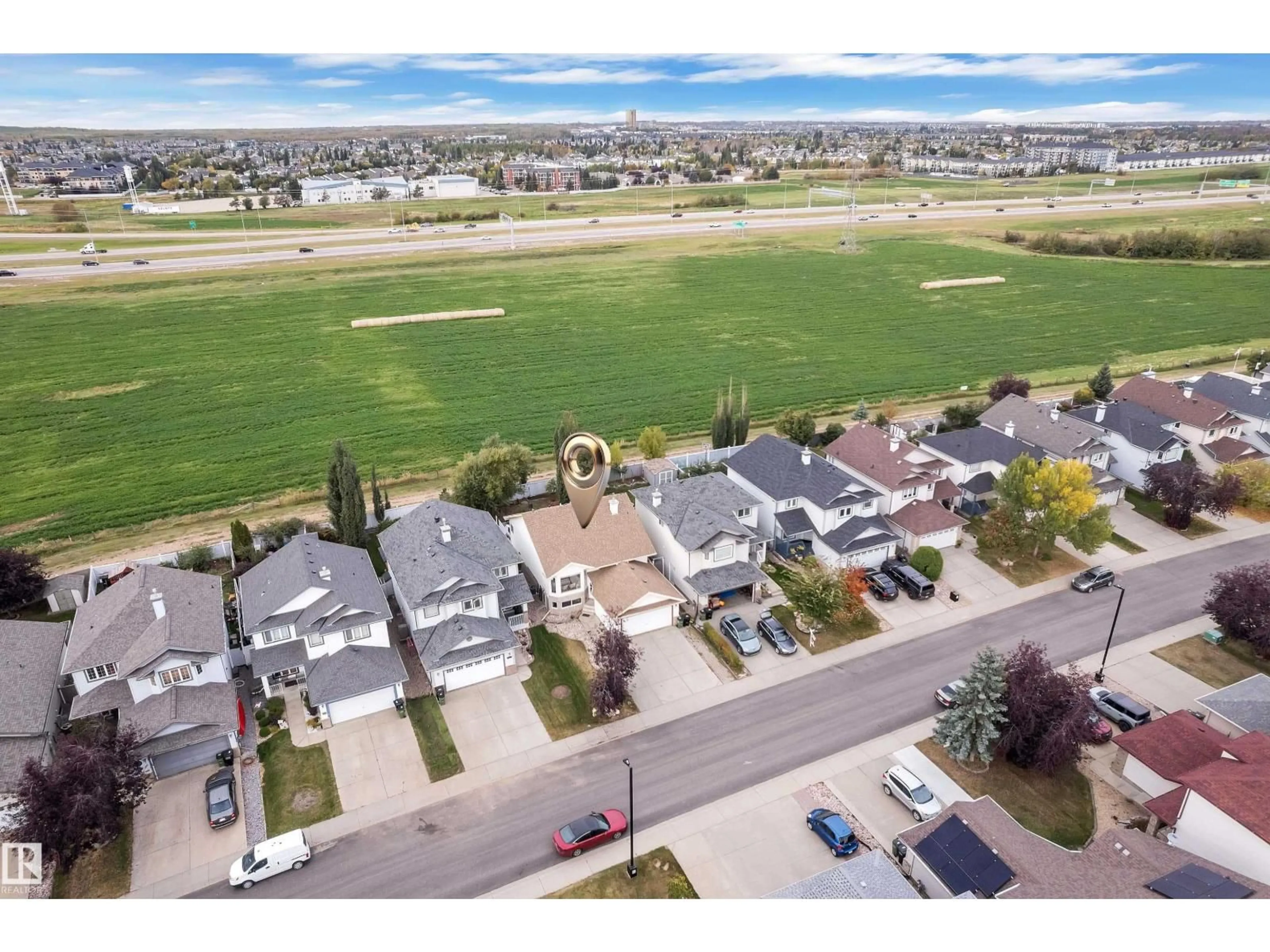 A pic from outside/outdoor area/front of a property/back of a property/a pic from drone, mountain view for 1233 ORMSBY LN, Edmonton Alberta T5T6R2