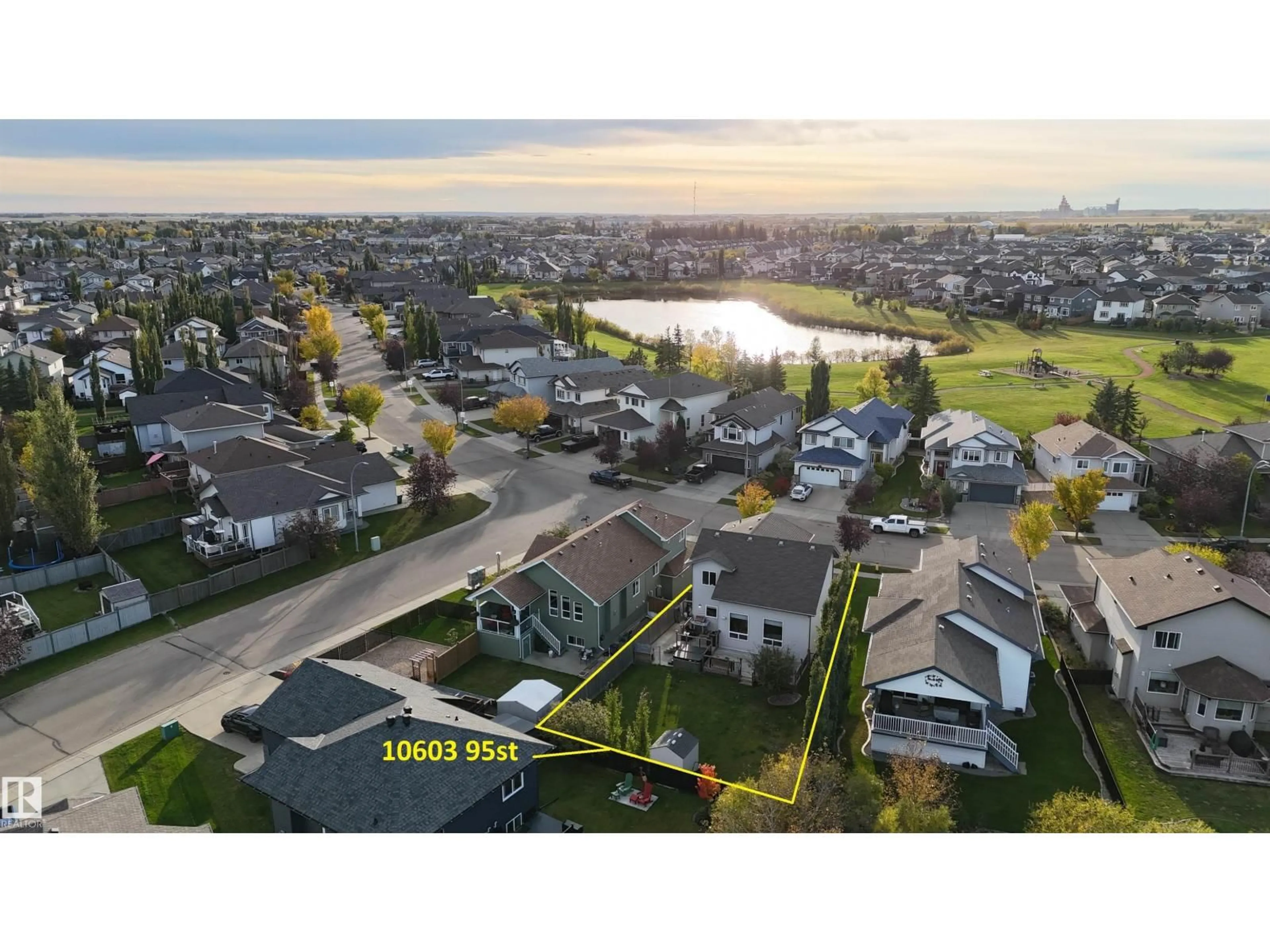 A pic from outside/outdoor area/front of a property/back of a property/a pic from drone, water/lake/river/ocean view for 10603 95 ST, Morinville Alberta T8R0A1