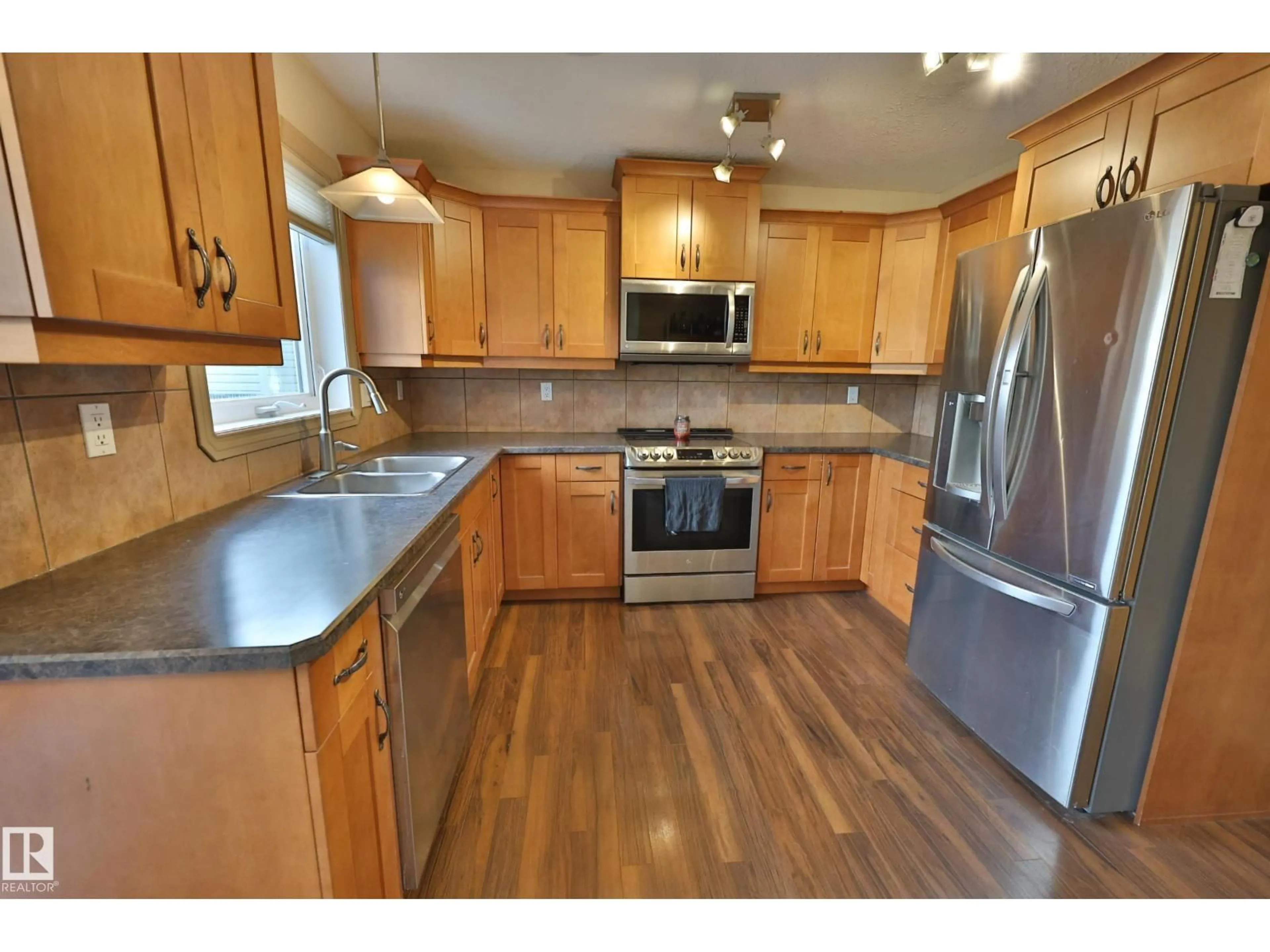 Open concept kitchen, unknown for 10603 95 ST, Morinville Alberta T8R0A1