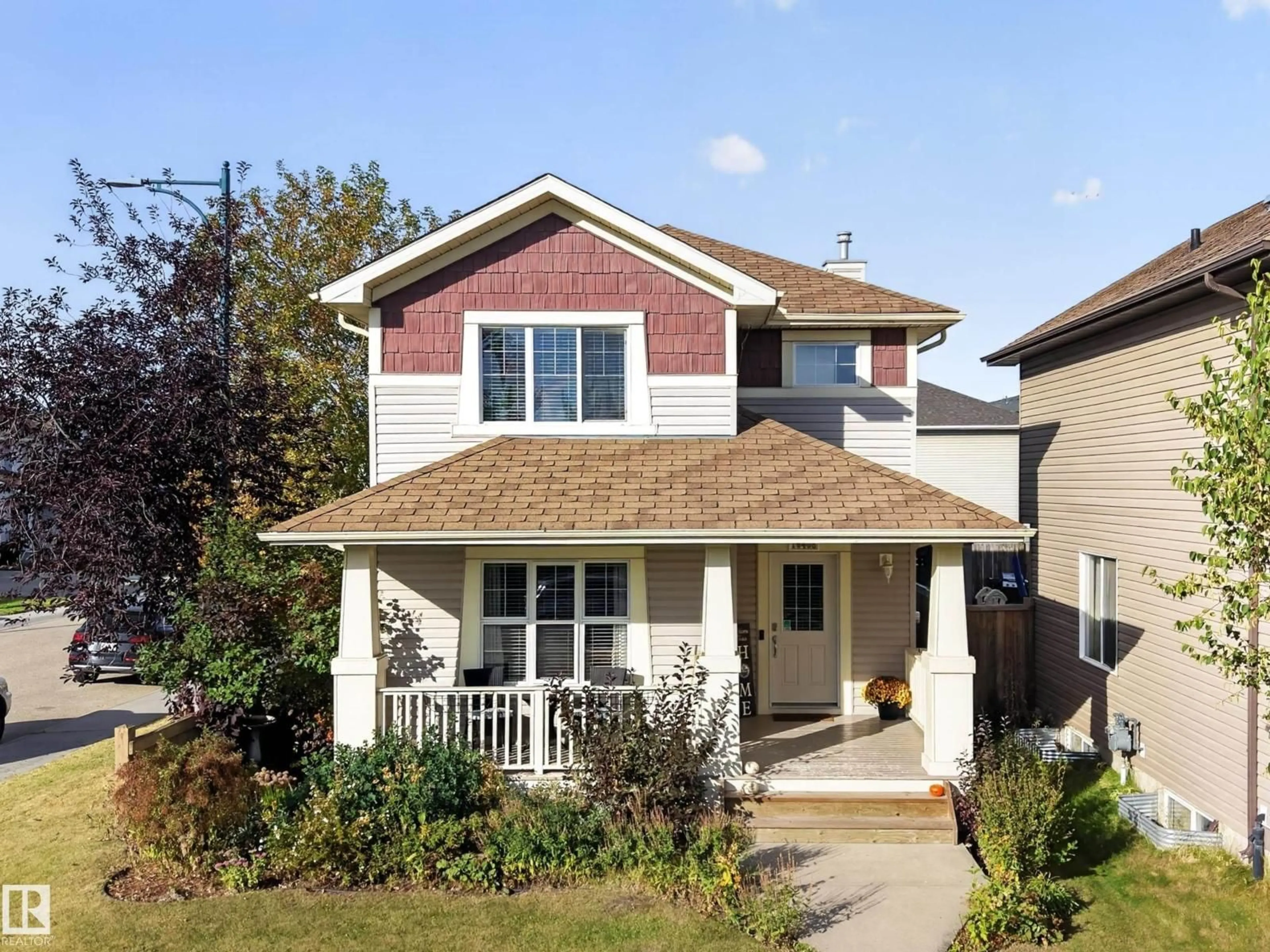 Home with vinyl exterior material, street for 16408 59 ST, Edmonton Alberta T5Y0B3