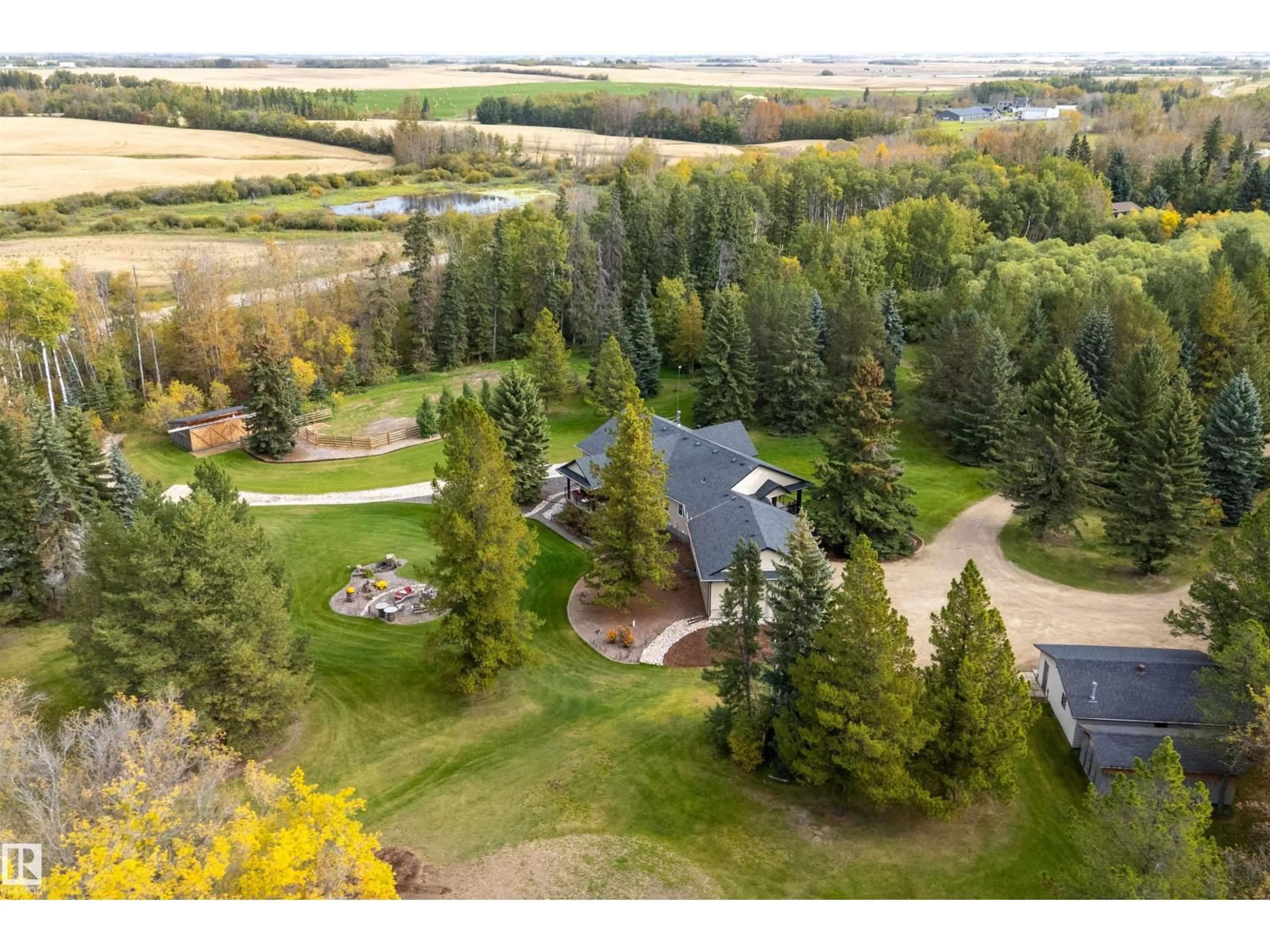 A pic from outside/outdoor area/front of a property/back of a property/a pic from drone, unknown for 54500 - 134 LAC STE ANNE, Rural Sturgeon County Alberta T8R1Z1