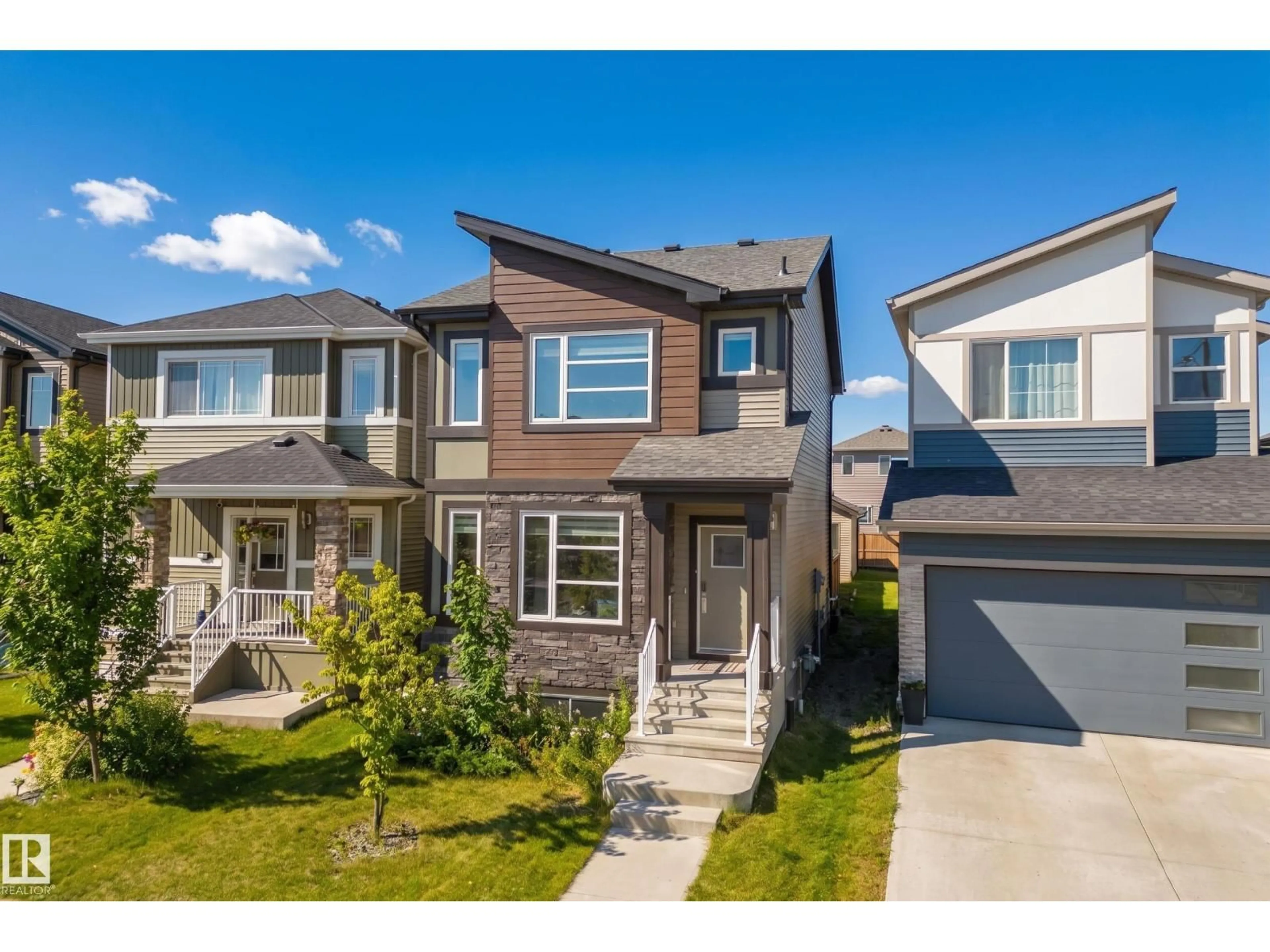Home with vinyl exterior material, street for SW - 7437 CREIGHTON PL, Edmonton Alberta T6W3Z2