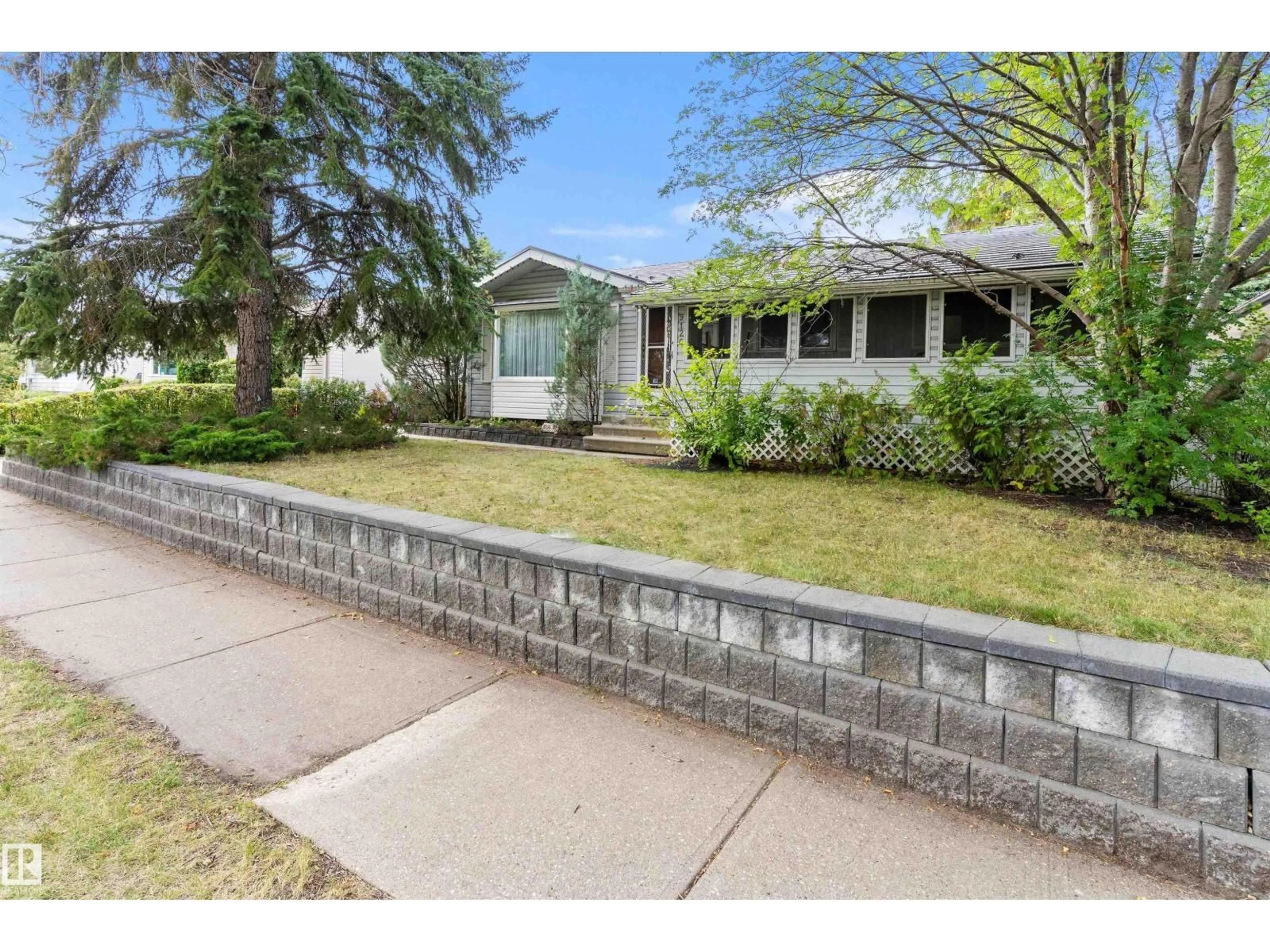 Home with brick exterior material, street for 9126 92 AV, Fort Saskatchewan Alberta T8L1A7