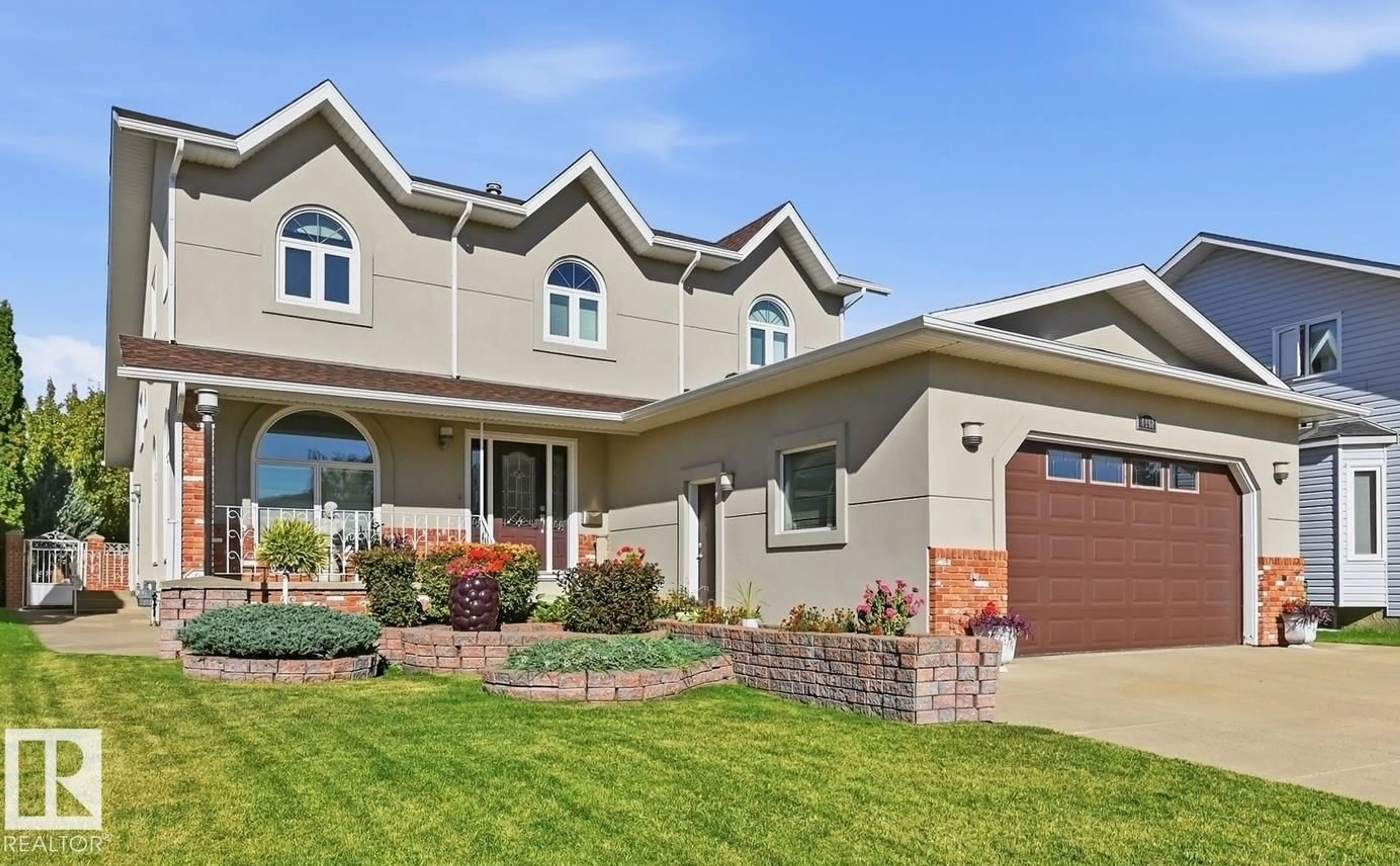 Home with vinyl exterior material, street for NW - 7708 158 AV, Edmonton Alberta T5Z2R7