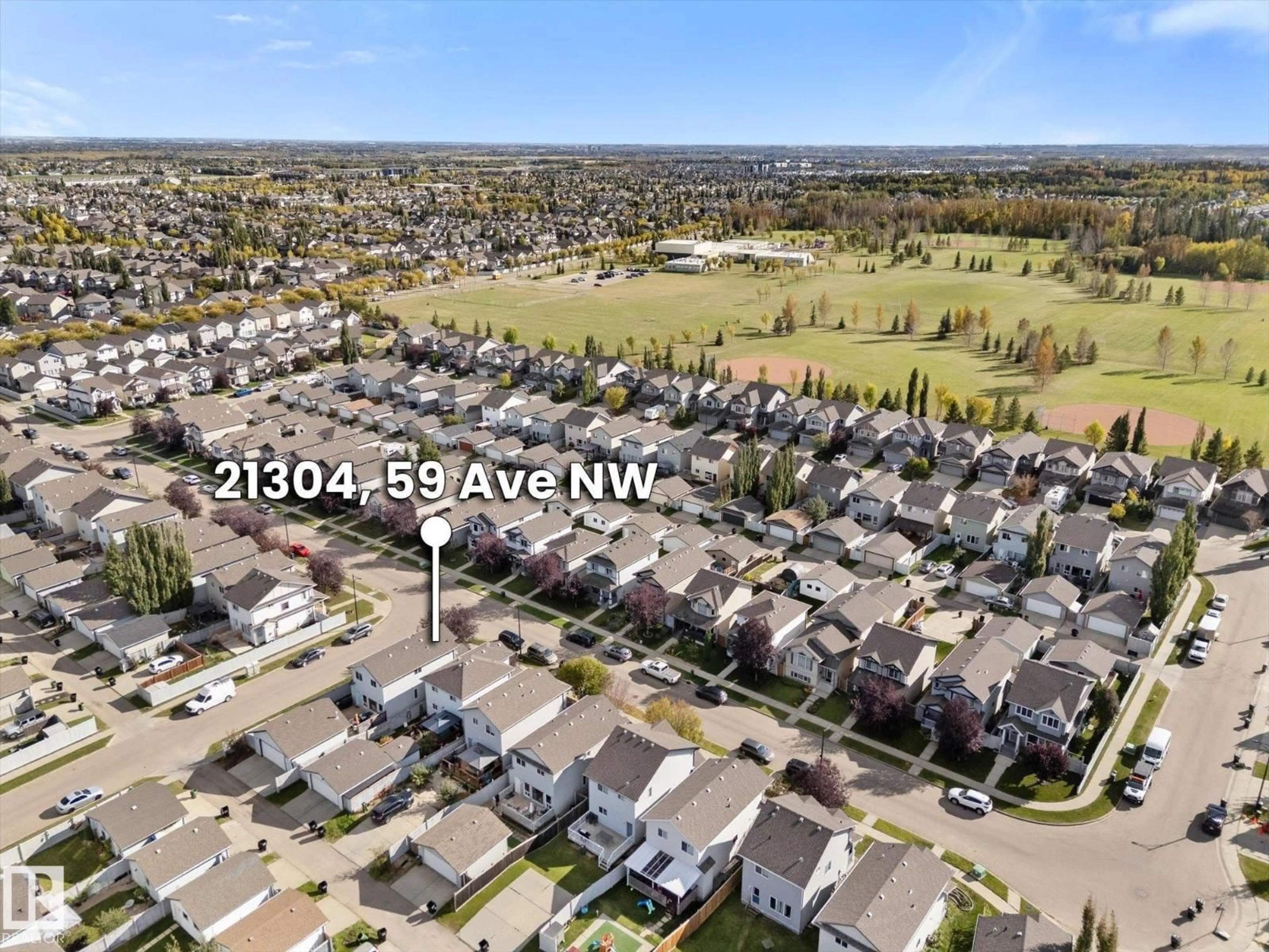 A pic from outside/outdoor area/front of a property/back of a property/a pic from drone, mountain view for NW - 21304 59 AV, Edmonton Alberta T6M0H5