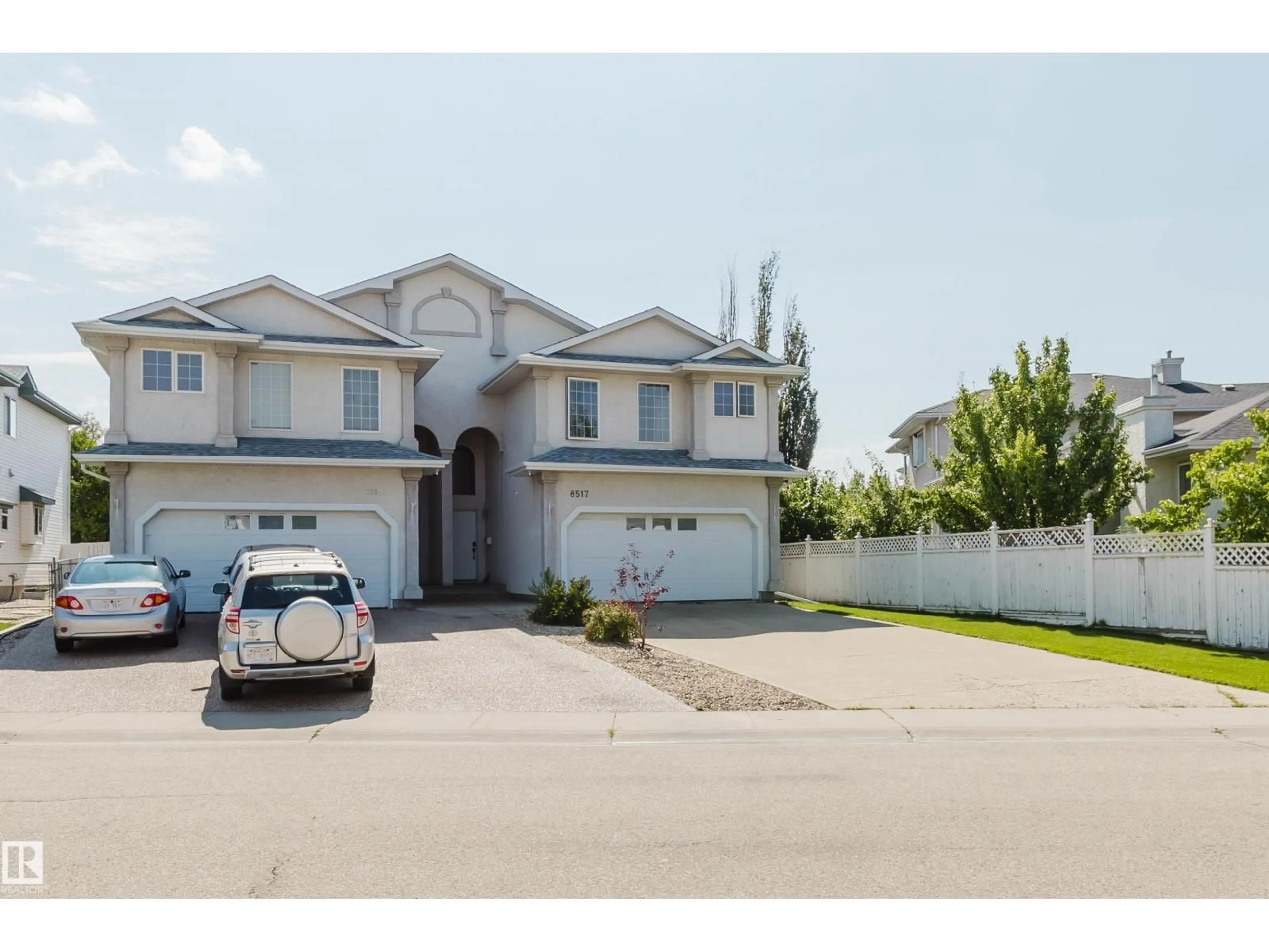 Home with vinyl exterior material, street for 8517 156 AV, Edmonton Alberta T5Z3B4