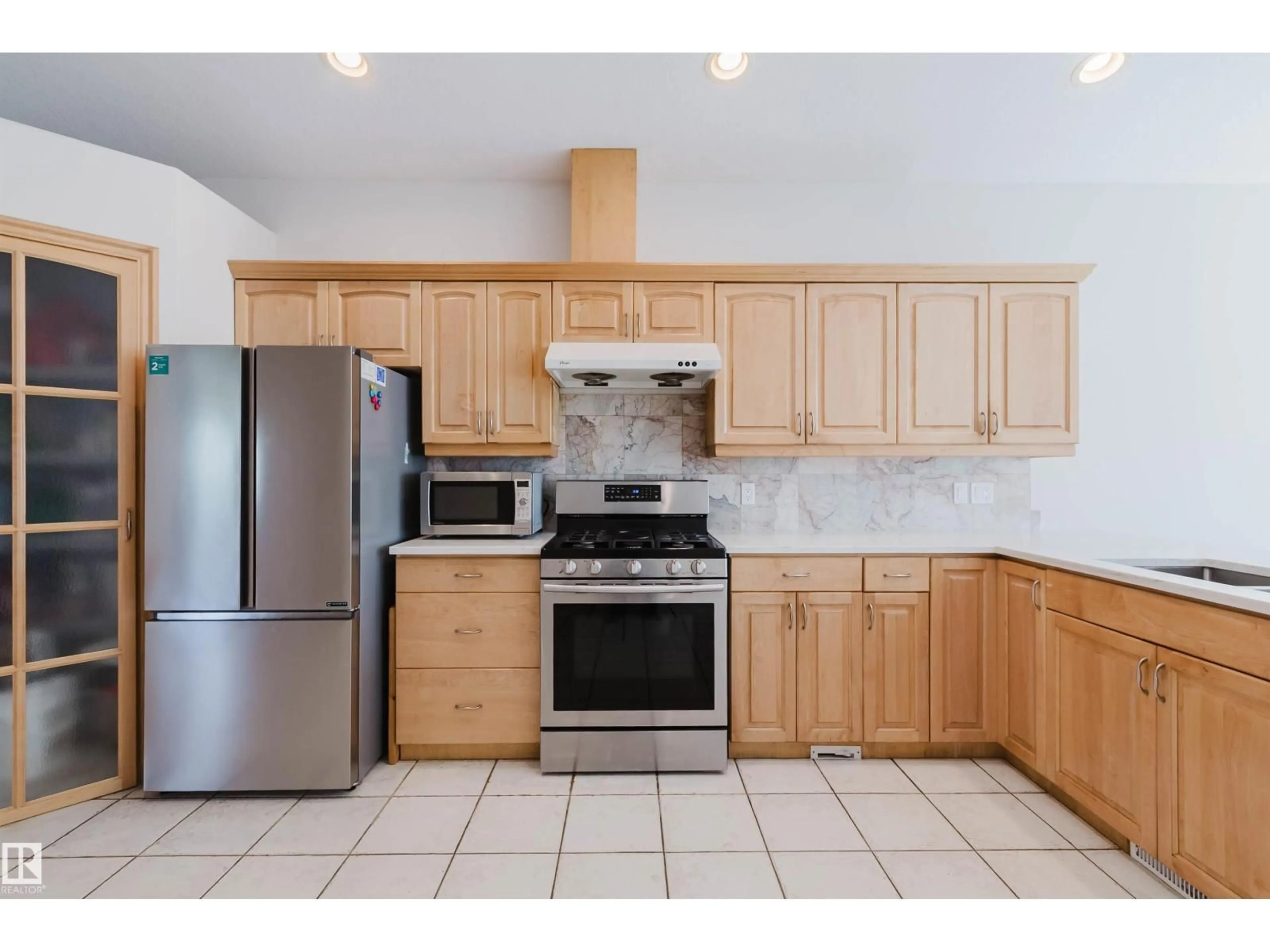 Standard kitchen, ceramic/tile floor for 8517 156 AV, Edmonton Alberta T5Z3B4
