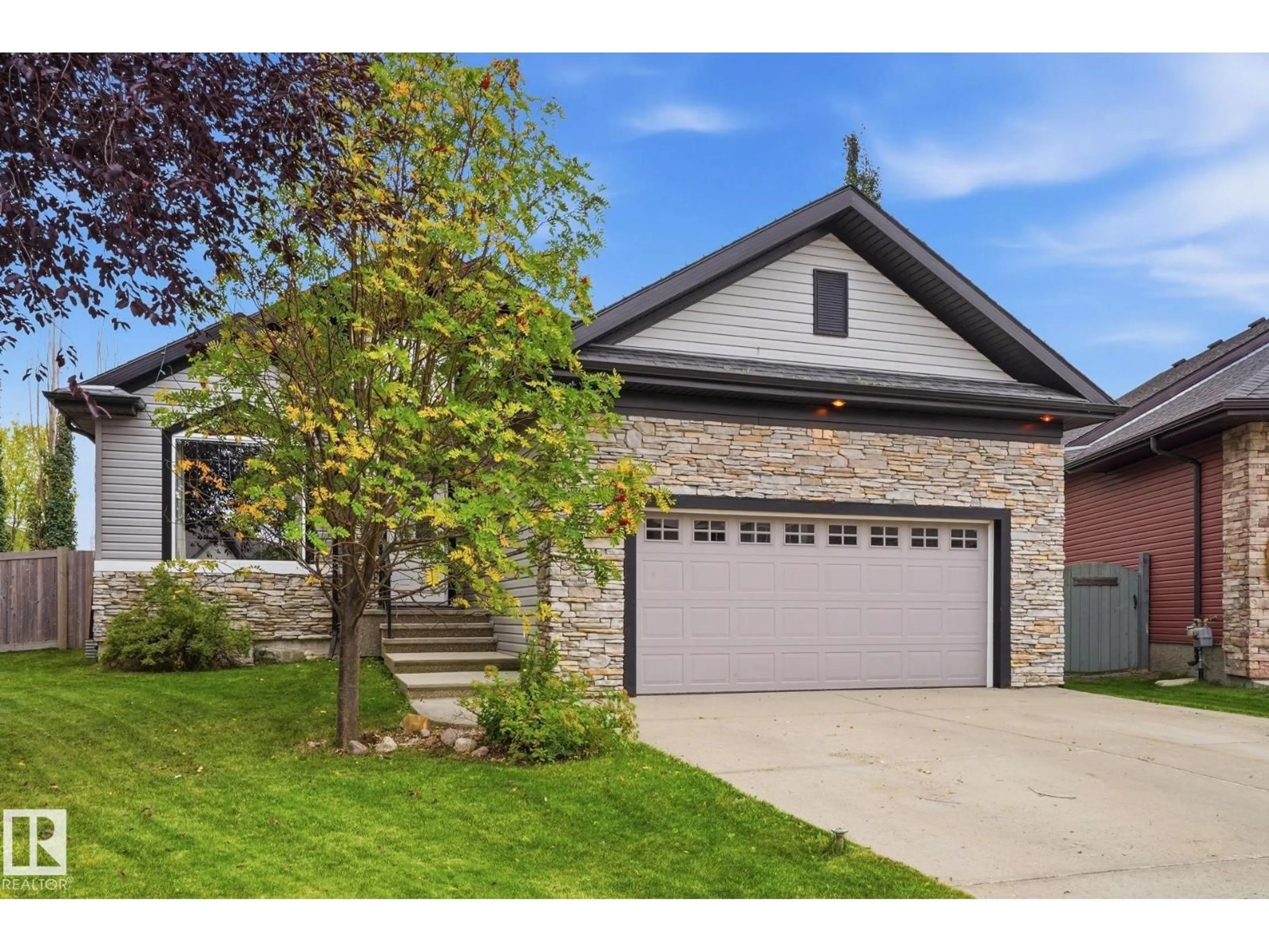 Home with brick exterior material, street for 1209 CUNNINGHAM DR, Edmonton Alberta T6W0R5