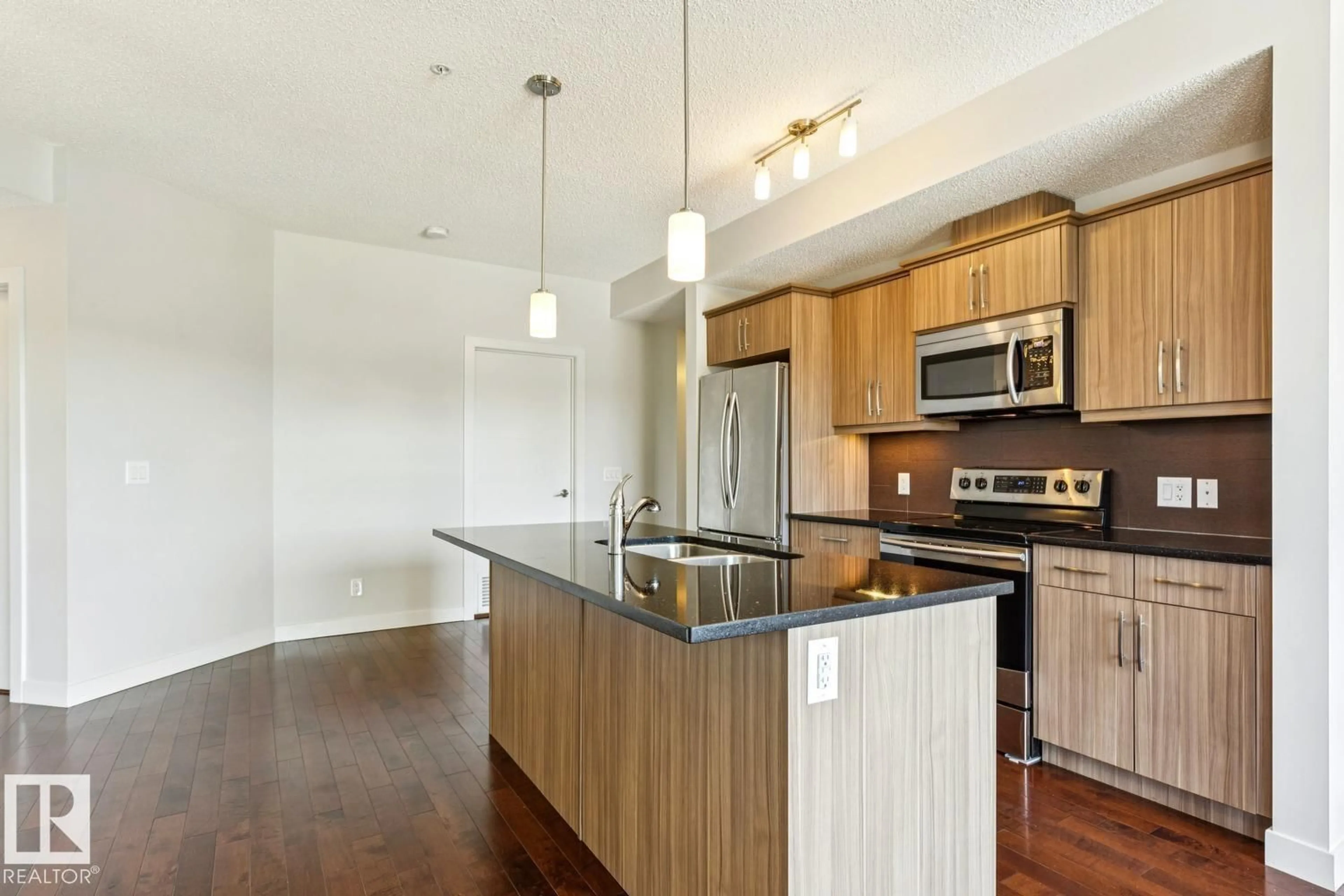 Open concept kitchen, unknown for #217 - 10523 123 ST, Edmonton Alberta T5N1N9