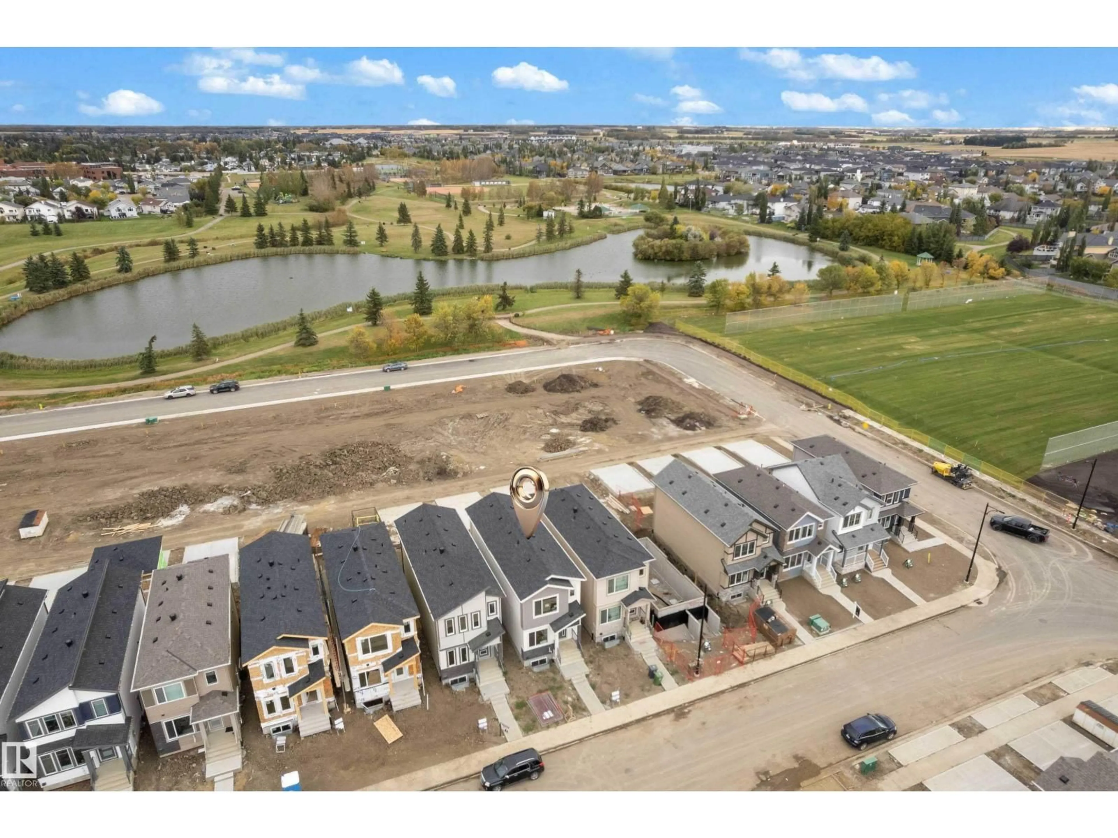 A pic from outside/outdoor area/front of a property/back of a property/a pic from drone, water/lake/river/ocean view for 4213 63 ST, Beaumont Alberta T4X3E9