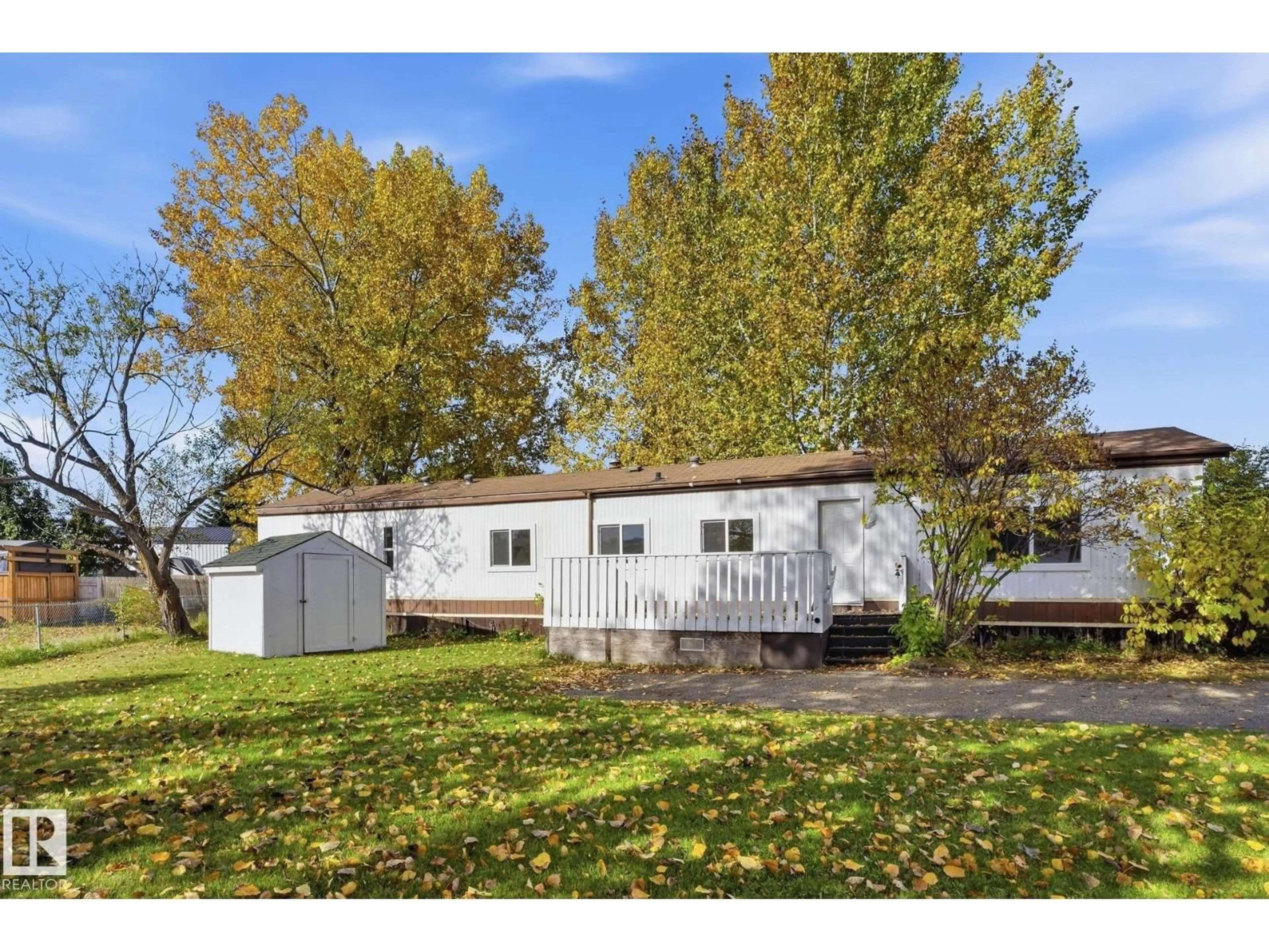Home with vinyl exterior material, street for 119 PARKLAND ACRES, Lacombe Alberta T4L1S8