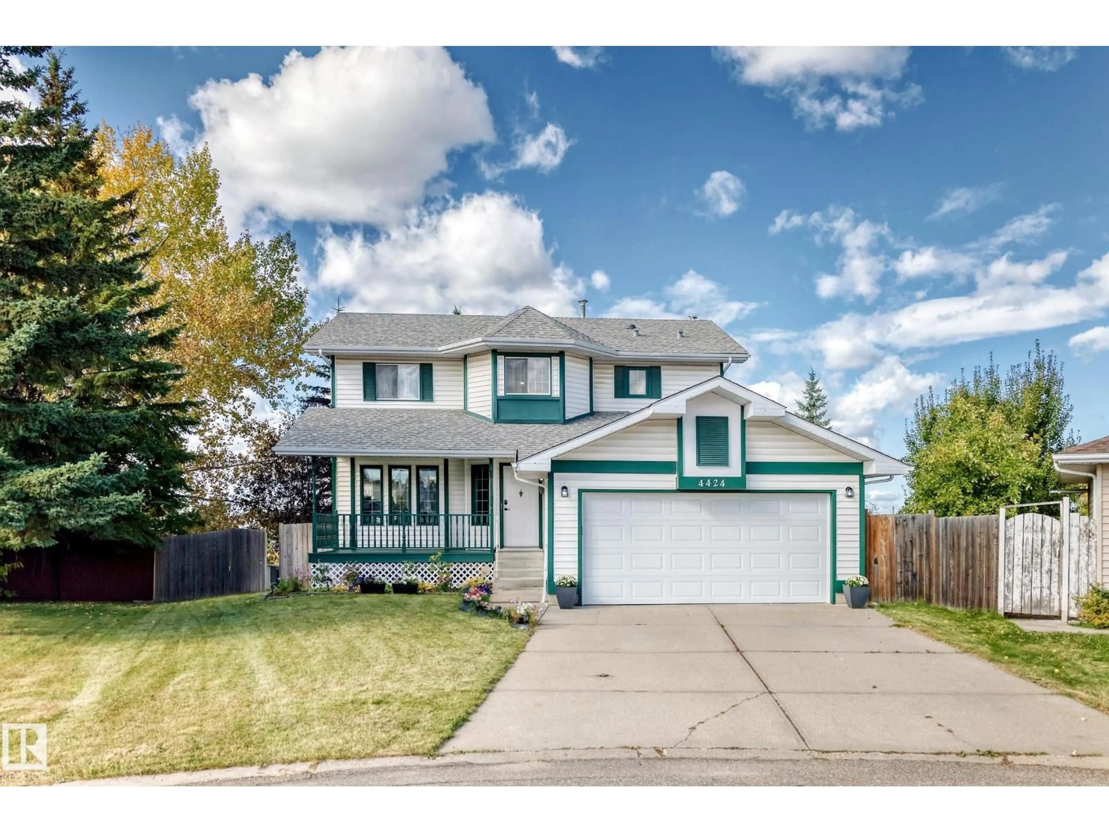 Home with vinyl exterior material, street for 4424 33 ST, Edmonton Alberta T6T1E9