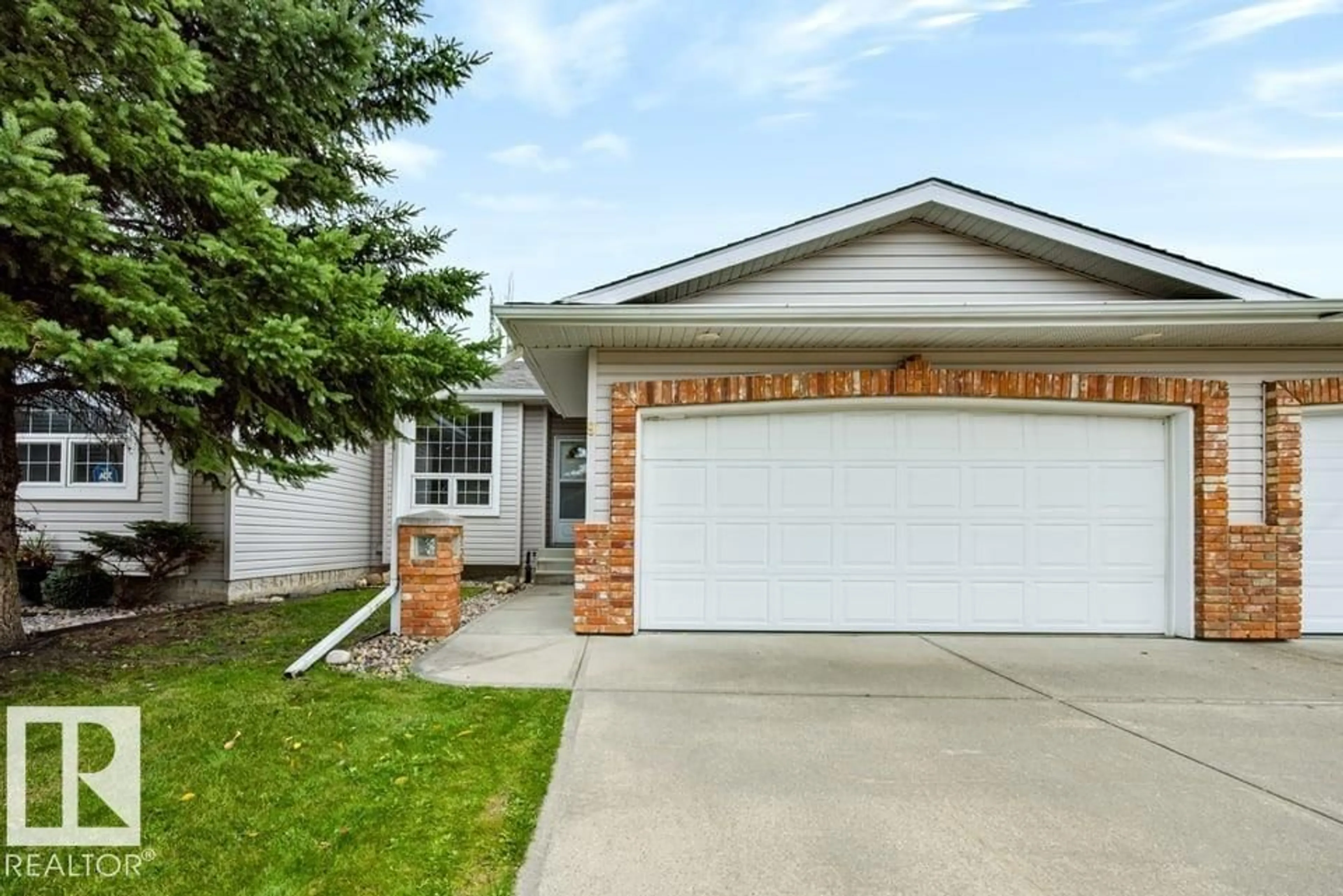 Home with vinyl exterior material, street for 9 HILLCREST CO, Spruce Grove Alberta T7X4A8