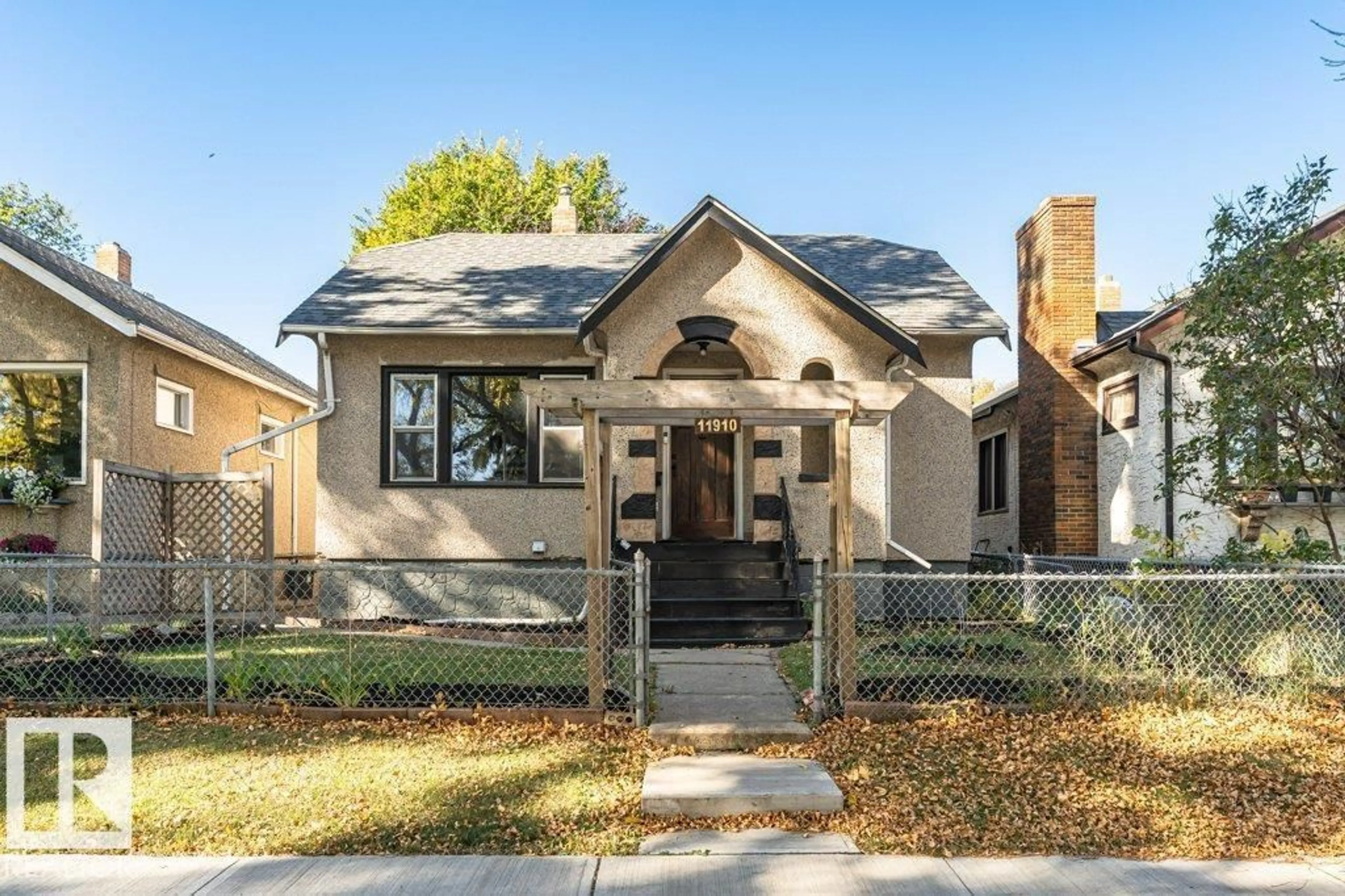 Home with brick exterior material, street for 11910 94 ST, Edmonton Alberta T5G1J5