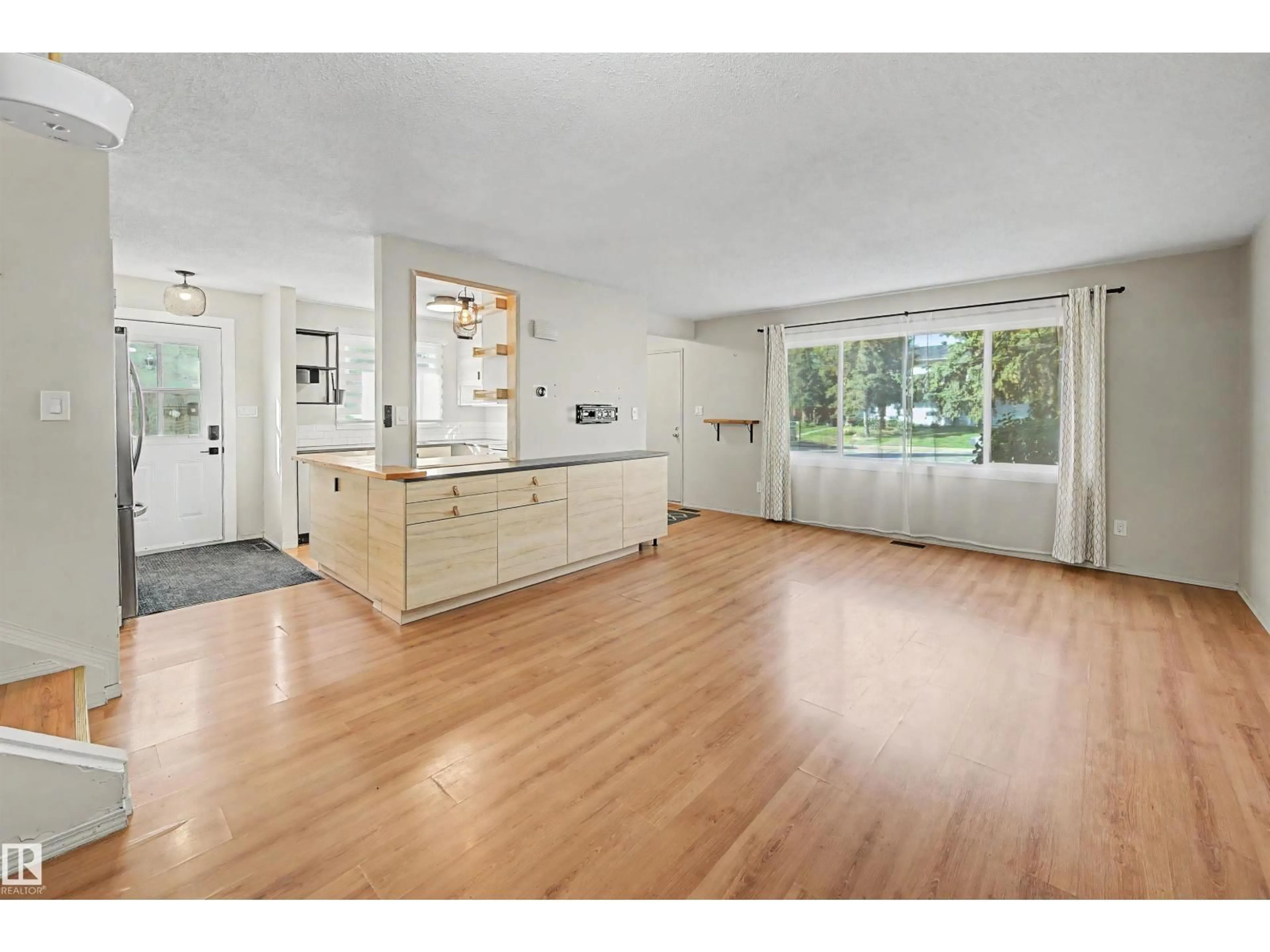 Open concept kitchen, unknown for NW - 3211 71 ST, Edmonton Alberta T6K1L1