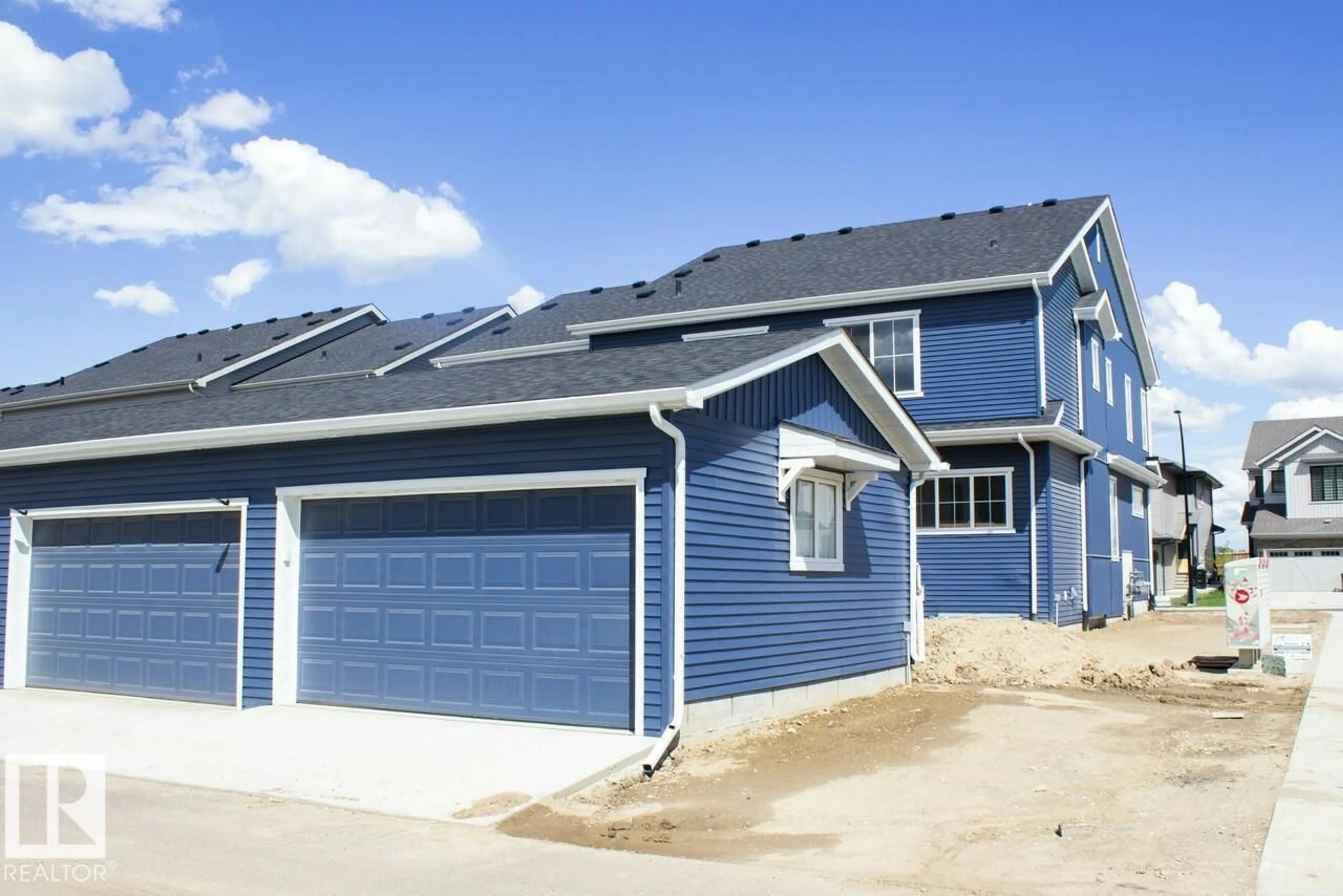 Home with vinyl exterior material, street for 416 26 ST, Edmonton Alberta T6X3J1