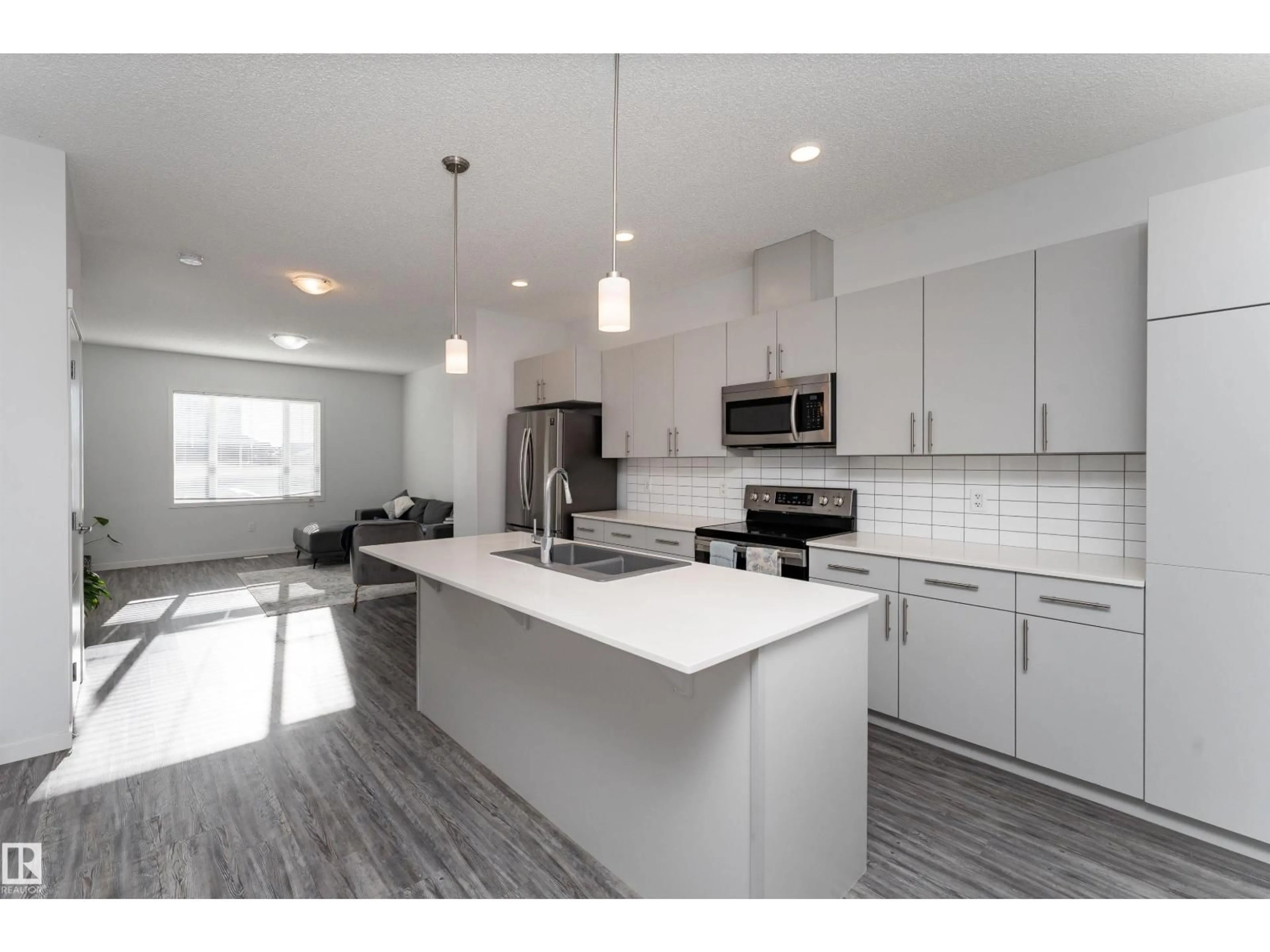 Open concept kitchen, unknown for 577 EBBERS WY, Edmonton Alberta T5Y3T8