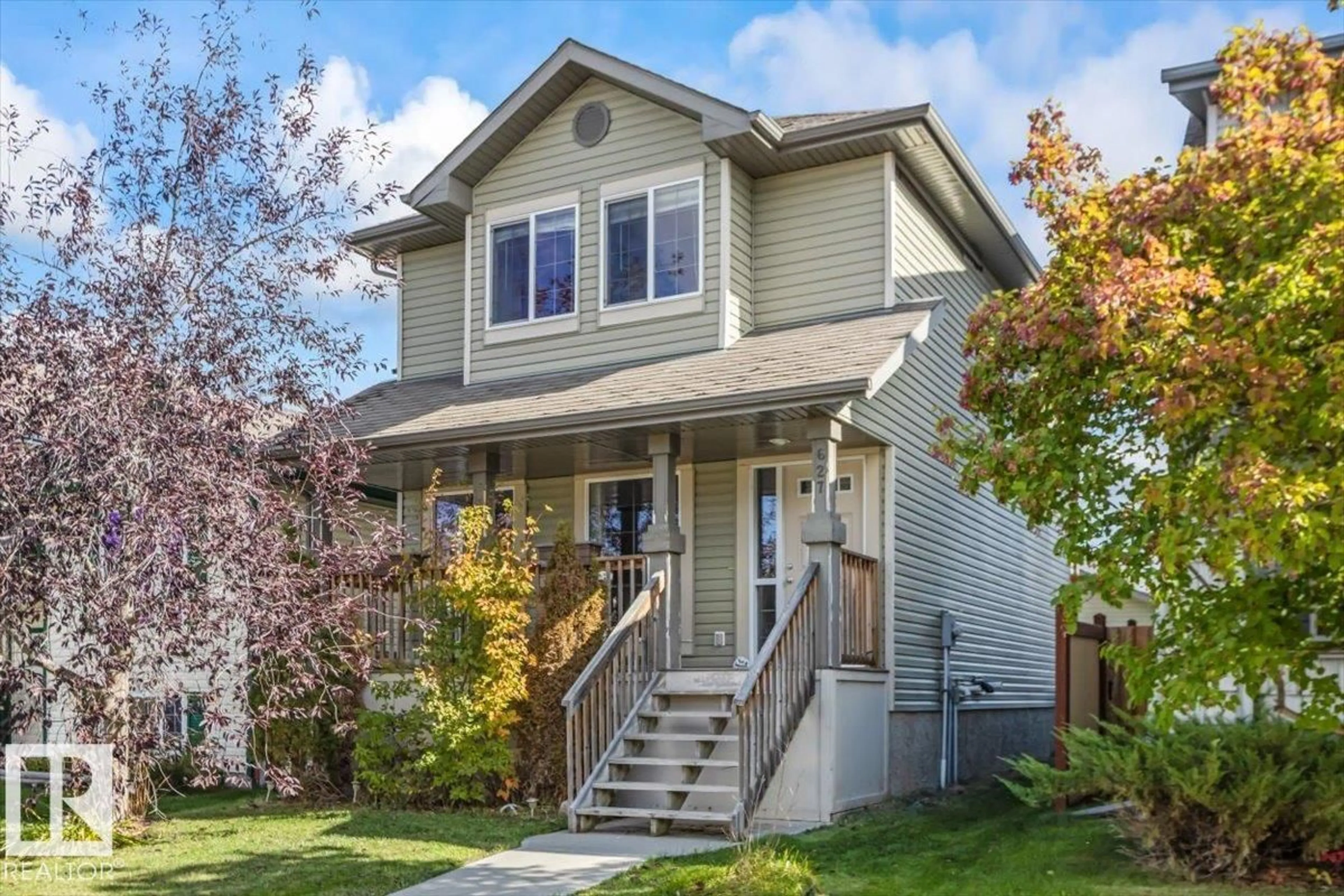 Home with vinyl exterior material, street for 627 SONGHURST WD, Leduc Alberta T9E0P6