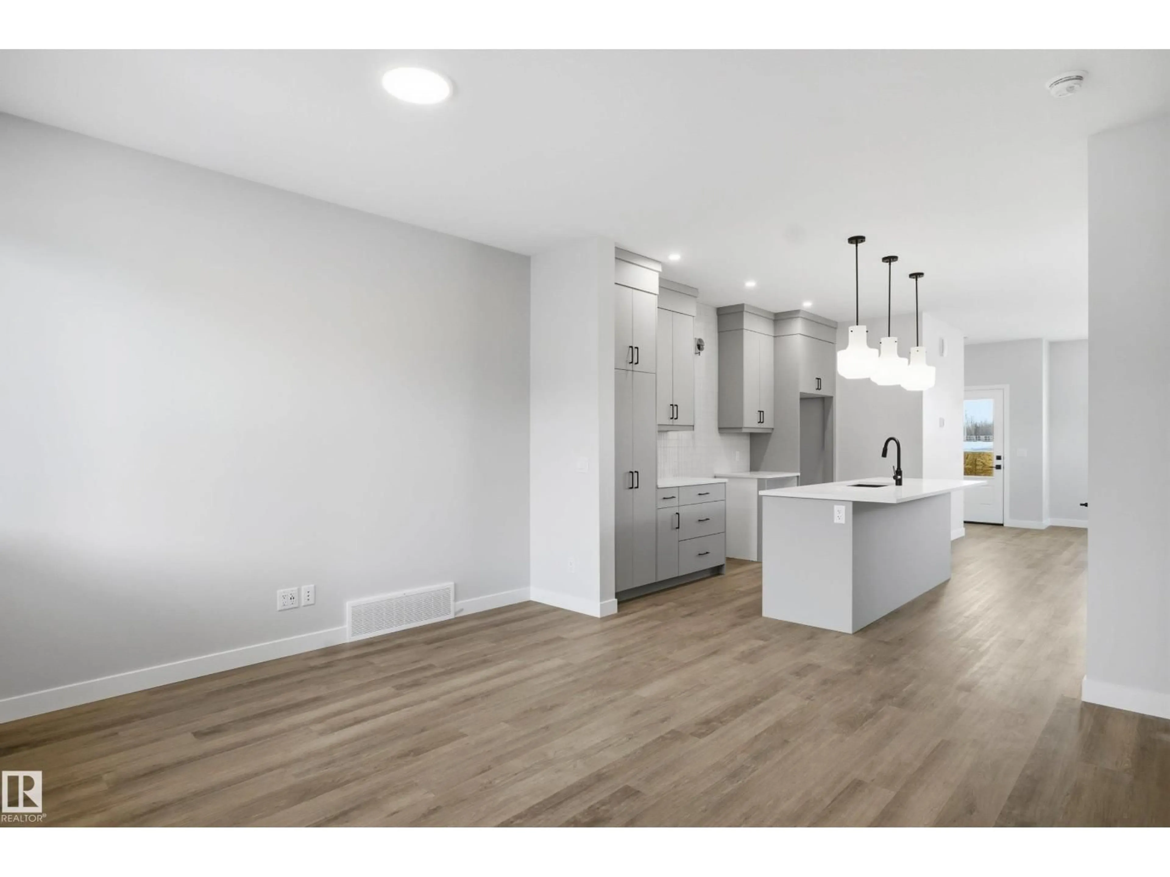 Open concept kitchen, wood/laminate floor for 3760 ERLANGER DR, Edmonton Alberta T6M1R9