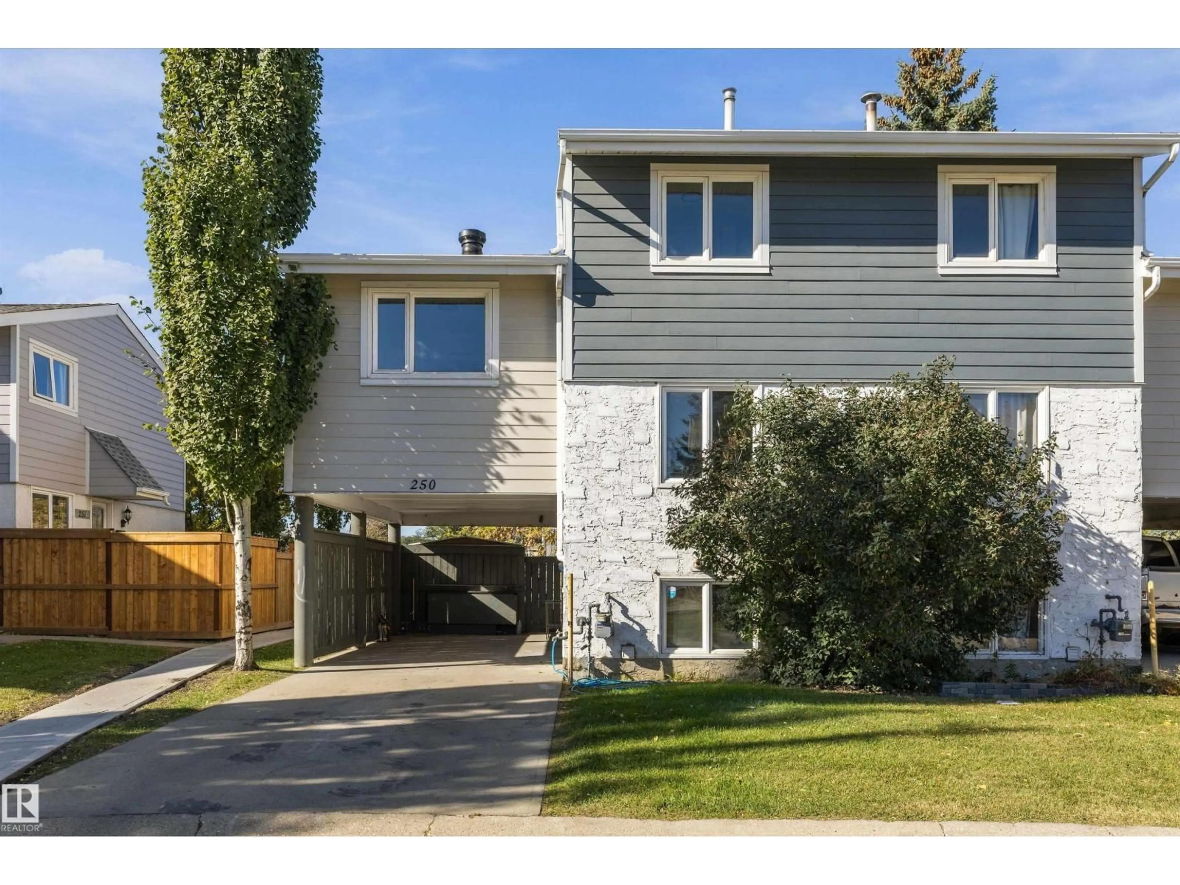 Home with vinyl exterior material, street for TWO - 250 CALLINGWOOD NW, Edmonton Alberta T5T1A3