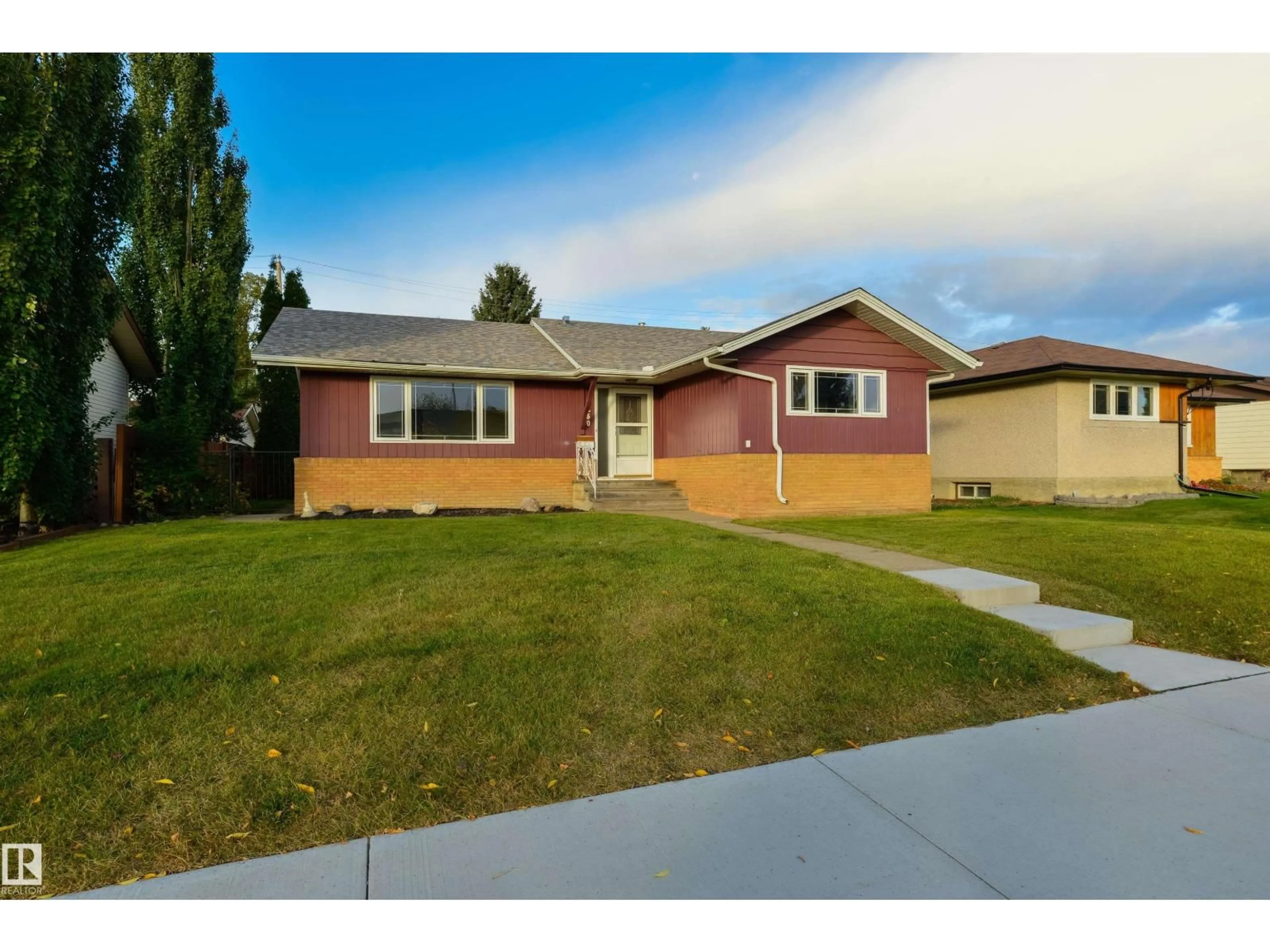 Home with vinyl exterior material, street for 9260 OTTEWELL RD, Edmonton Alberta T6B2C9