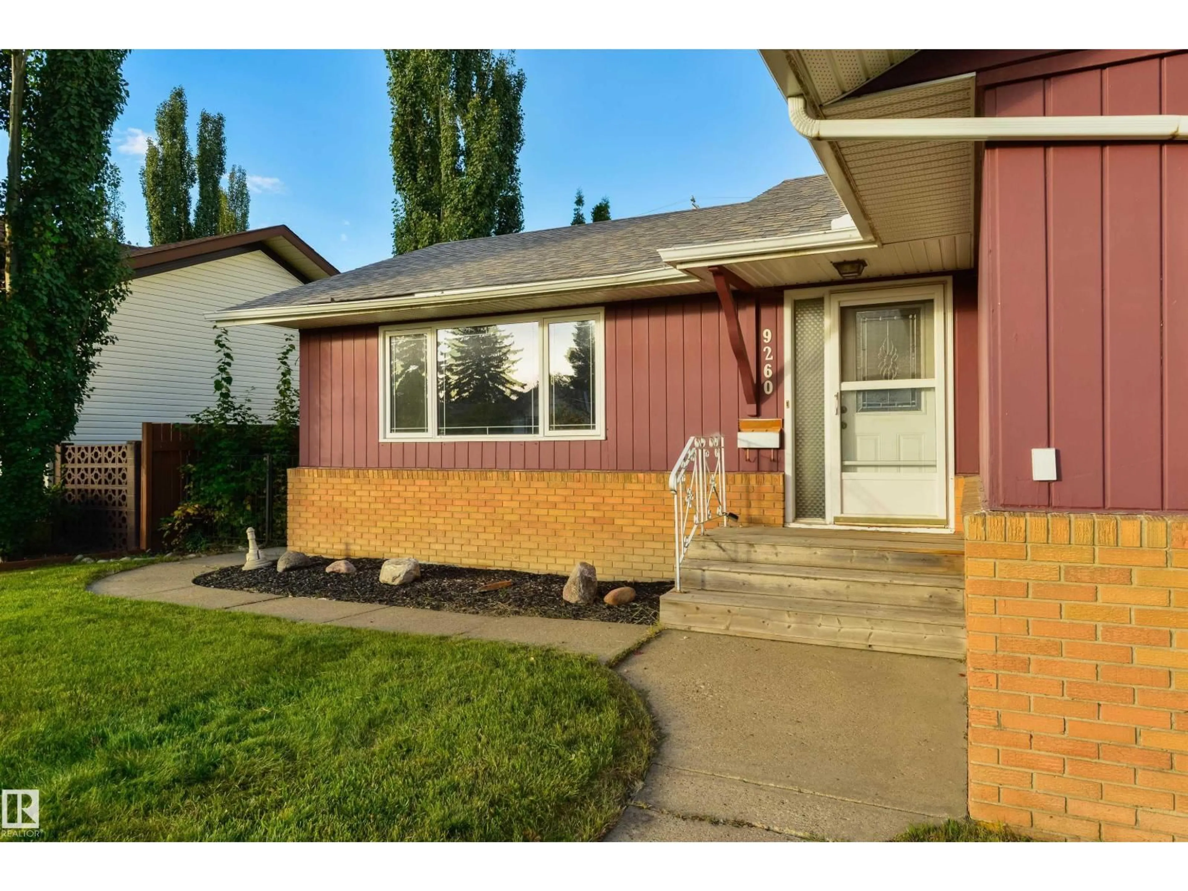 Home with vinyl exterior material, street for 9260 OTTEWELL RD, Edmonton Alberta T6B2C9