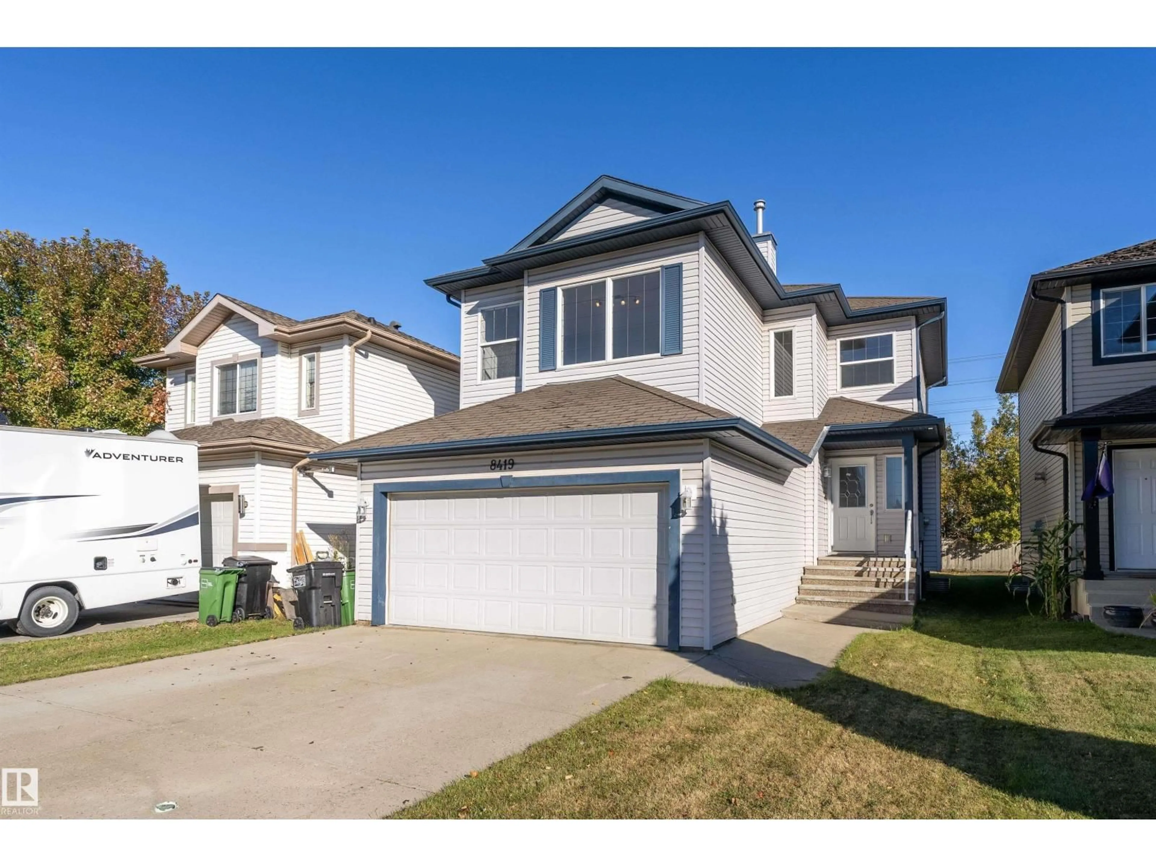 Home with vinyl exterior material, street for SW - 8419 2 AV, Edmonton Alberta T6X1H5