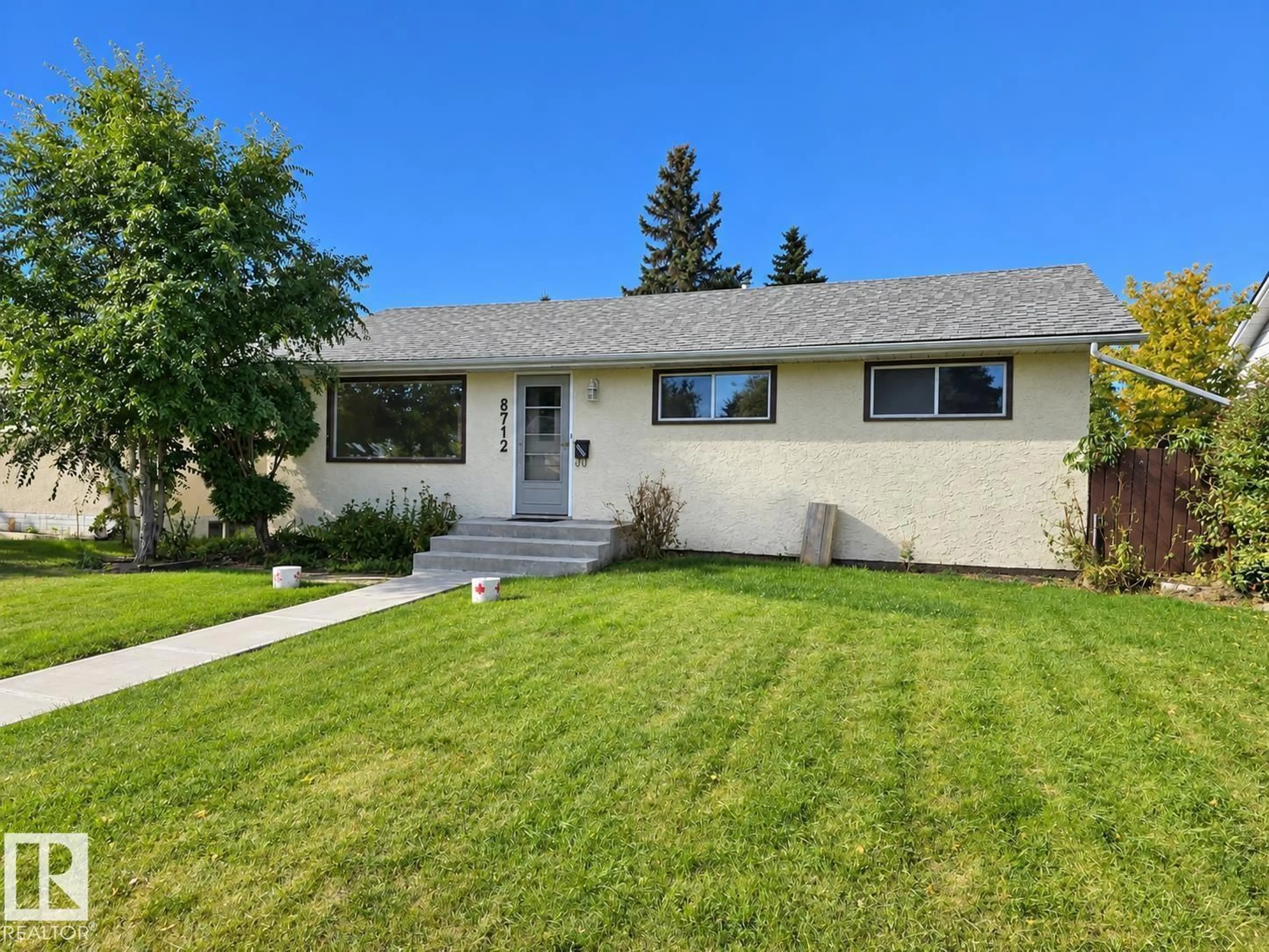 Home with vinyl exterior material, street for NW - 8712 162 ST, Edmonton Alberta T5R2M1