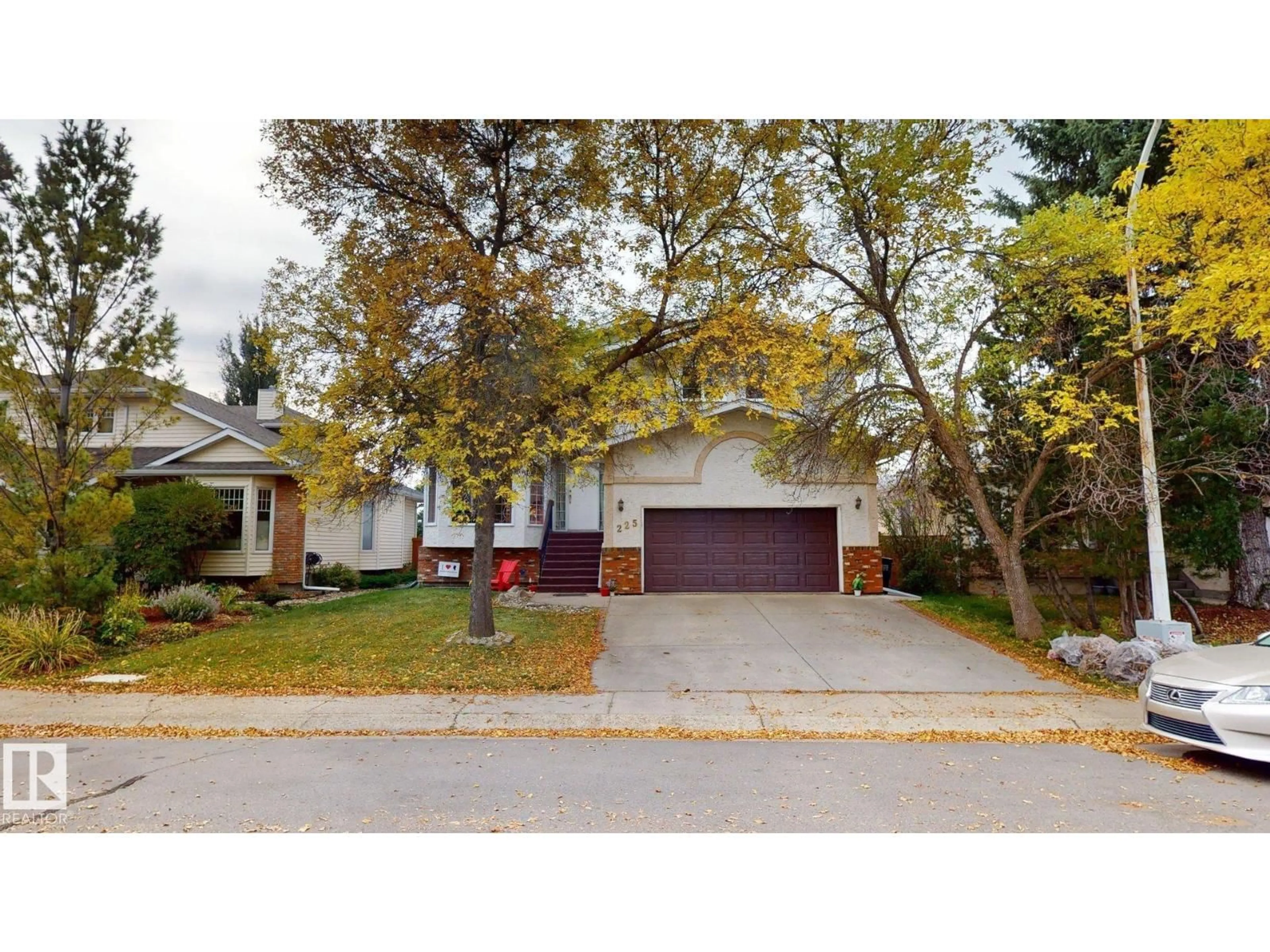 Home with vinyl exterior material, street for NW - 225 HEAGLE CR, Edmonton Alberta T6R1V6