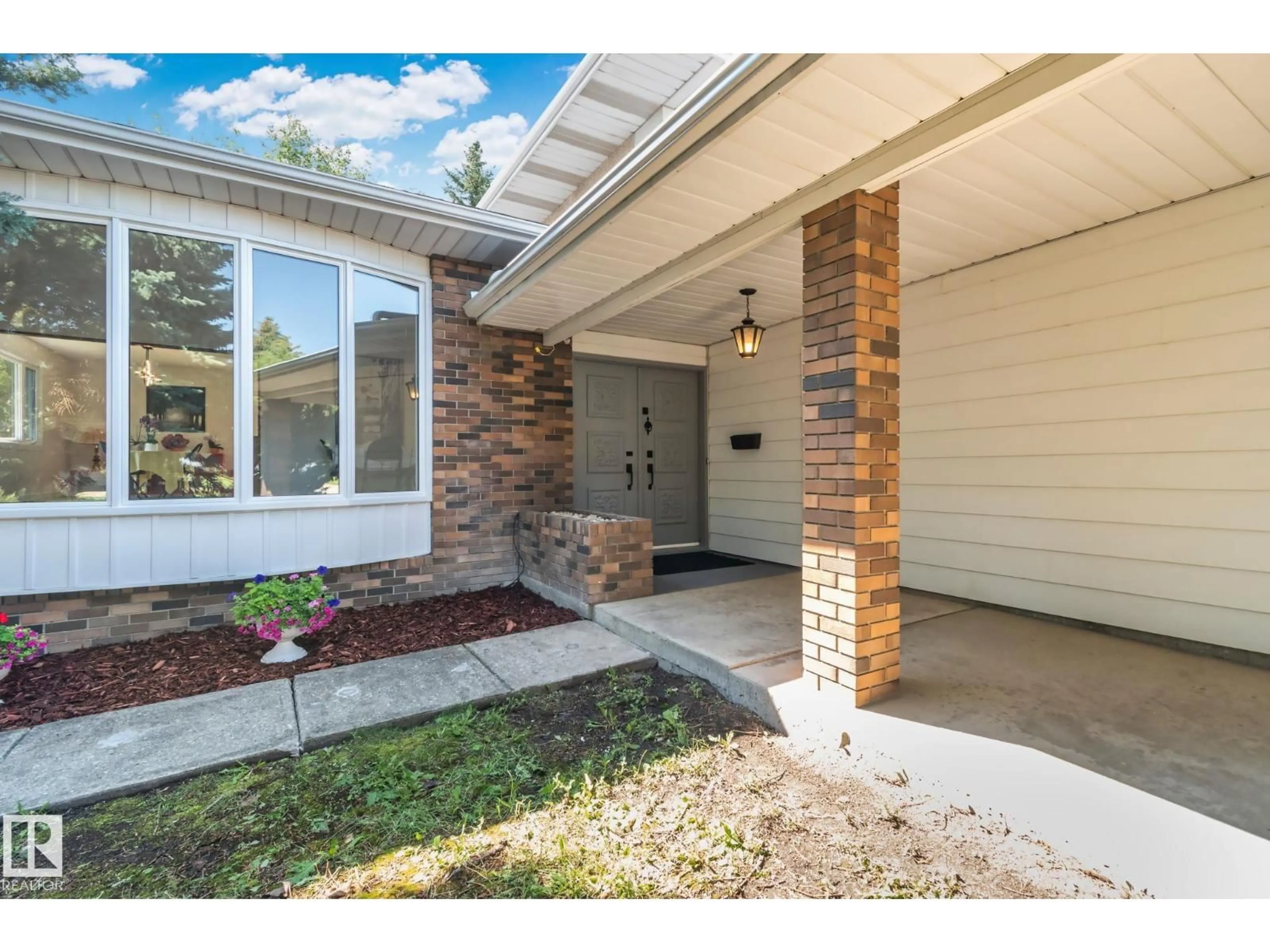 Home with brick exterior material, street for 10619 35 AV, Edmonton Alberta T6J2V8