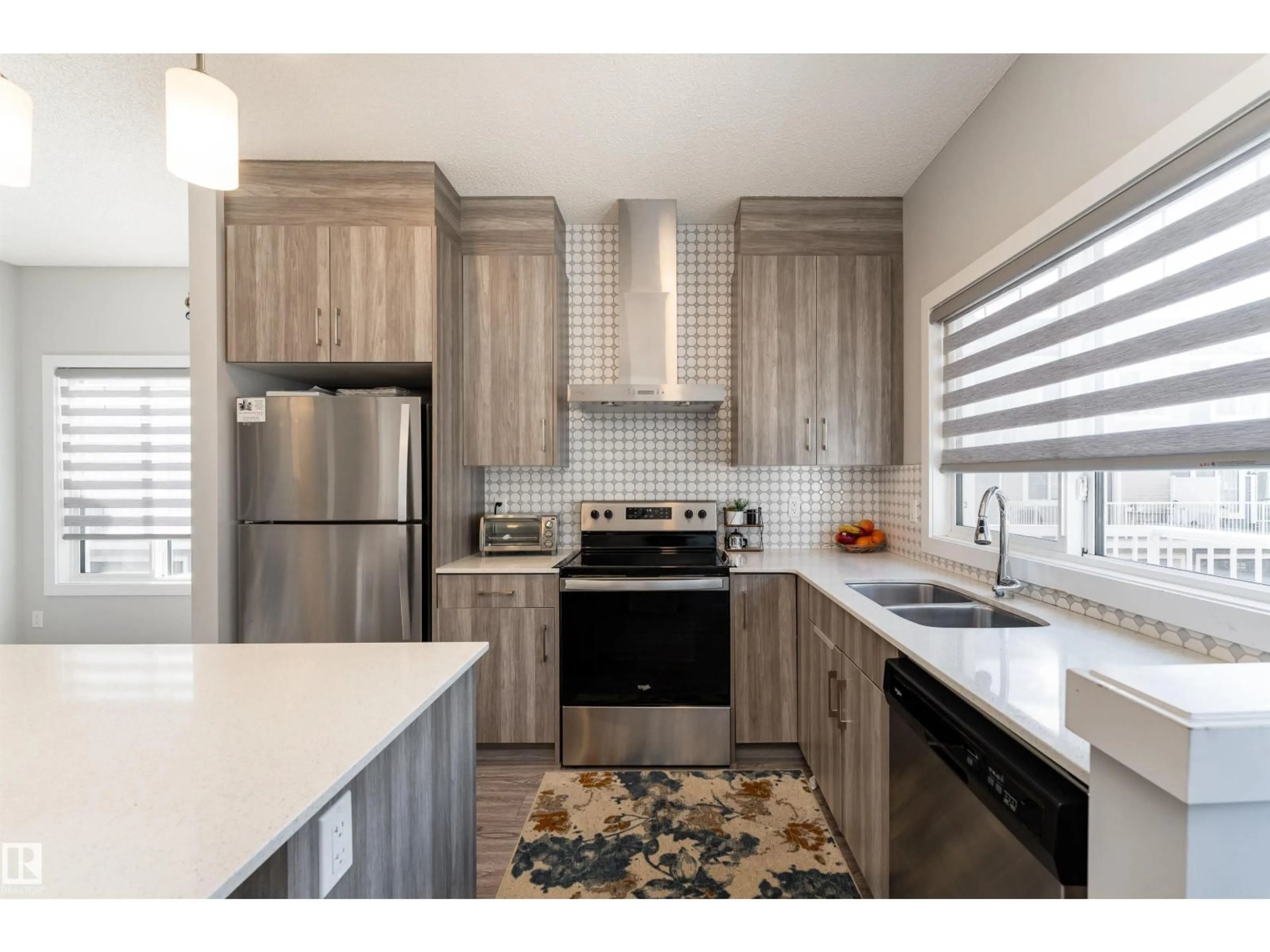 Open concept kitchen, unknown for #41 - 2215 24 ST, Edmonton Alberta T6T1A6