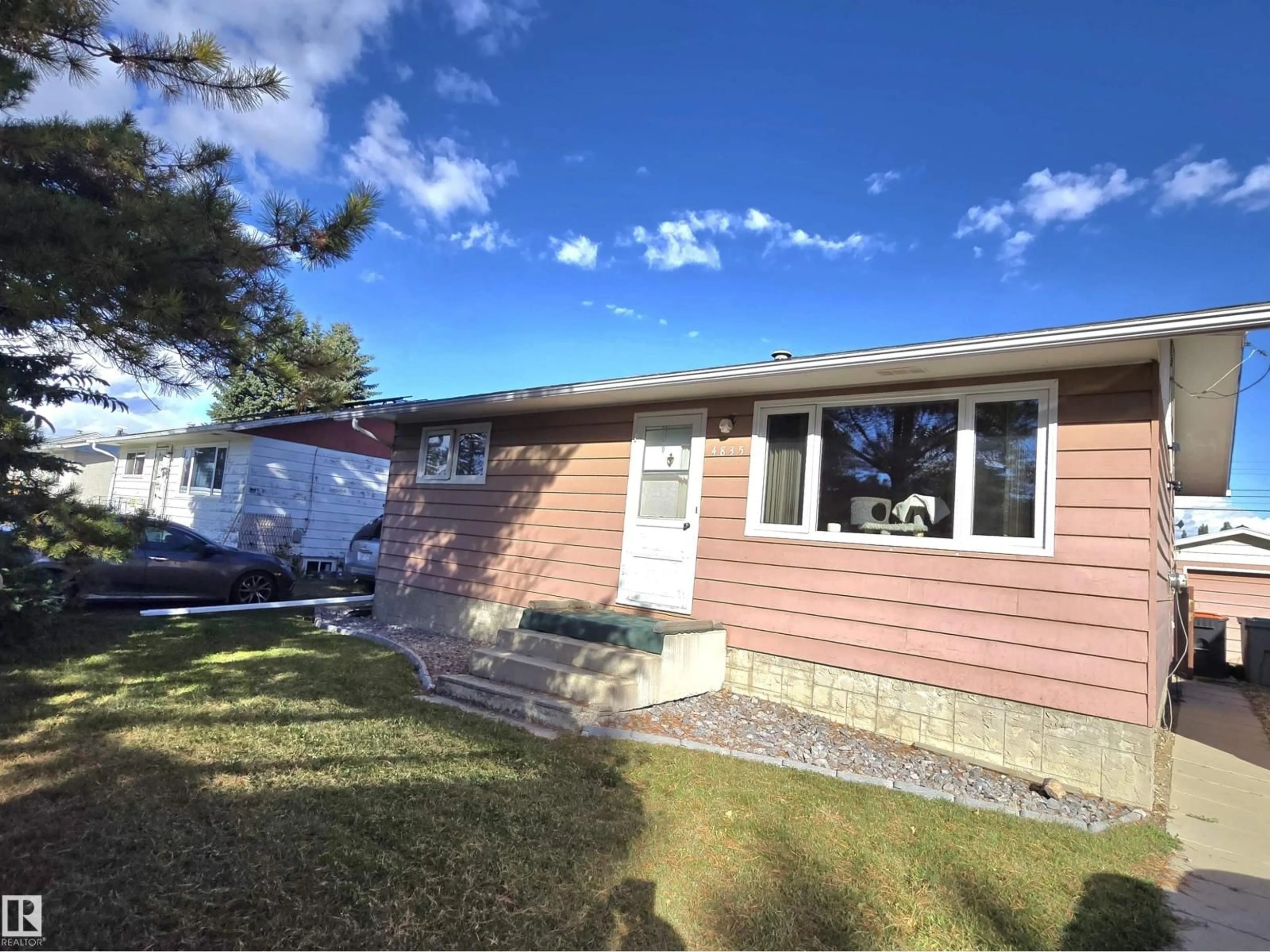 Home with vinyl exterior material, street for 4835 47 ST, Thorsby Alberta T0C2P0