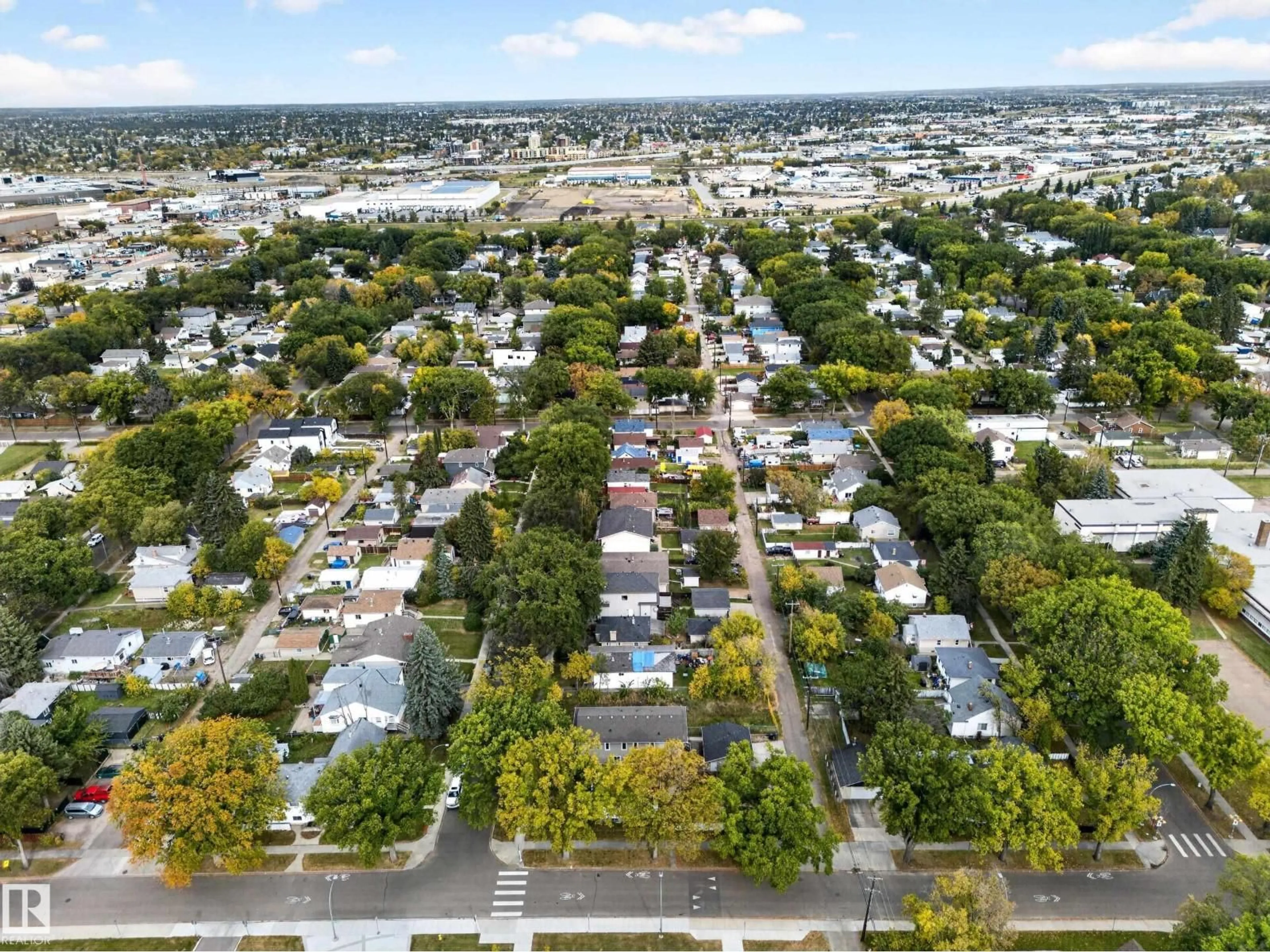 A pic from outside/outdoor area/front of a property/back of a property/a pic from drone, city buildings view from balcony for NW - 12020 63 ST, Edmonton Alberta T5W4G4