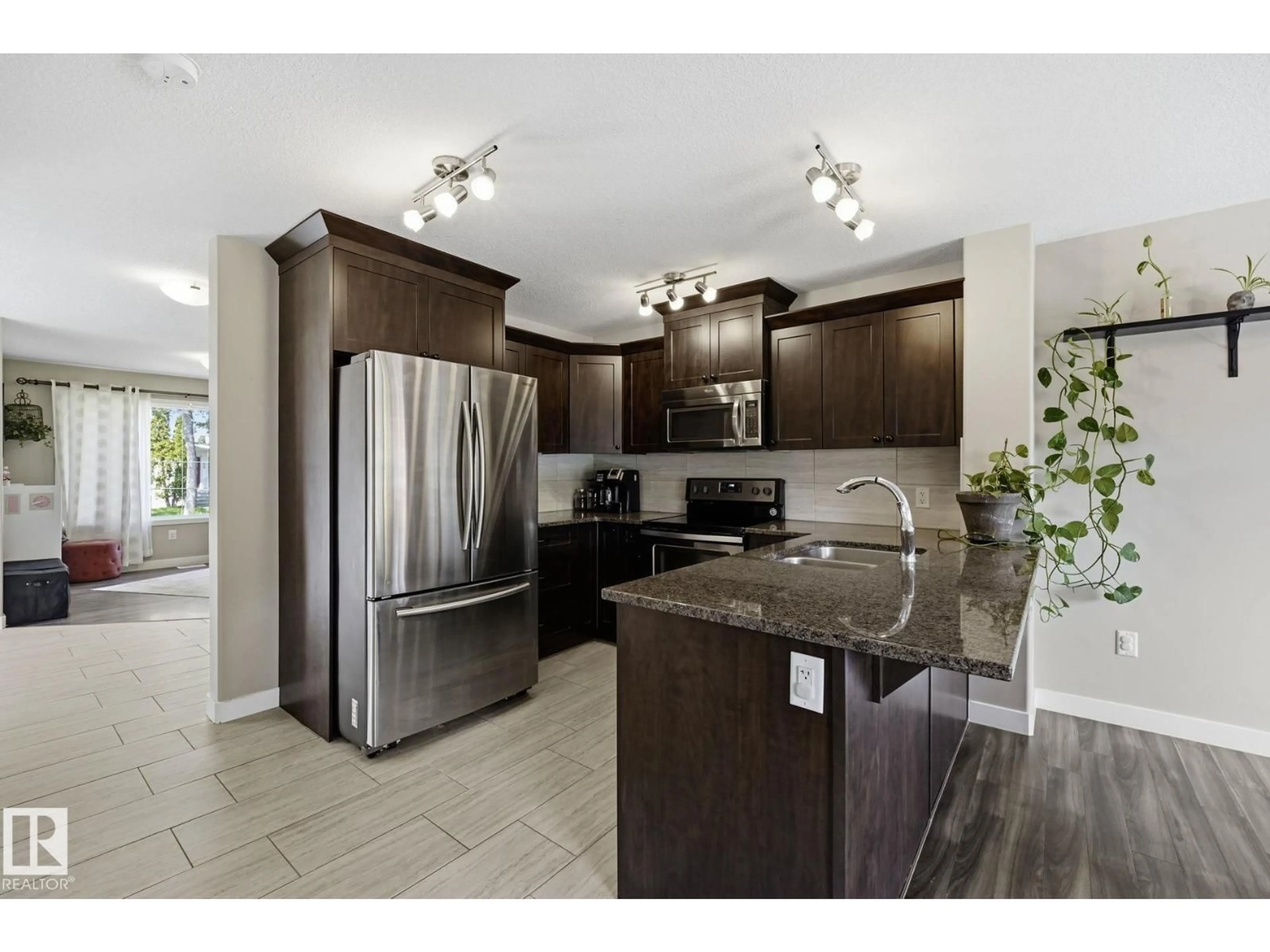 Open concept kitchen, ceramic/tile floor for NW - 10245 152 ST, Edmonton Alberta T5P1Y3
