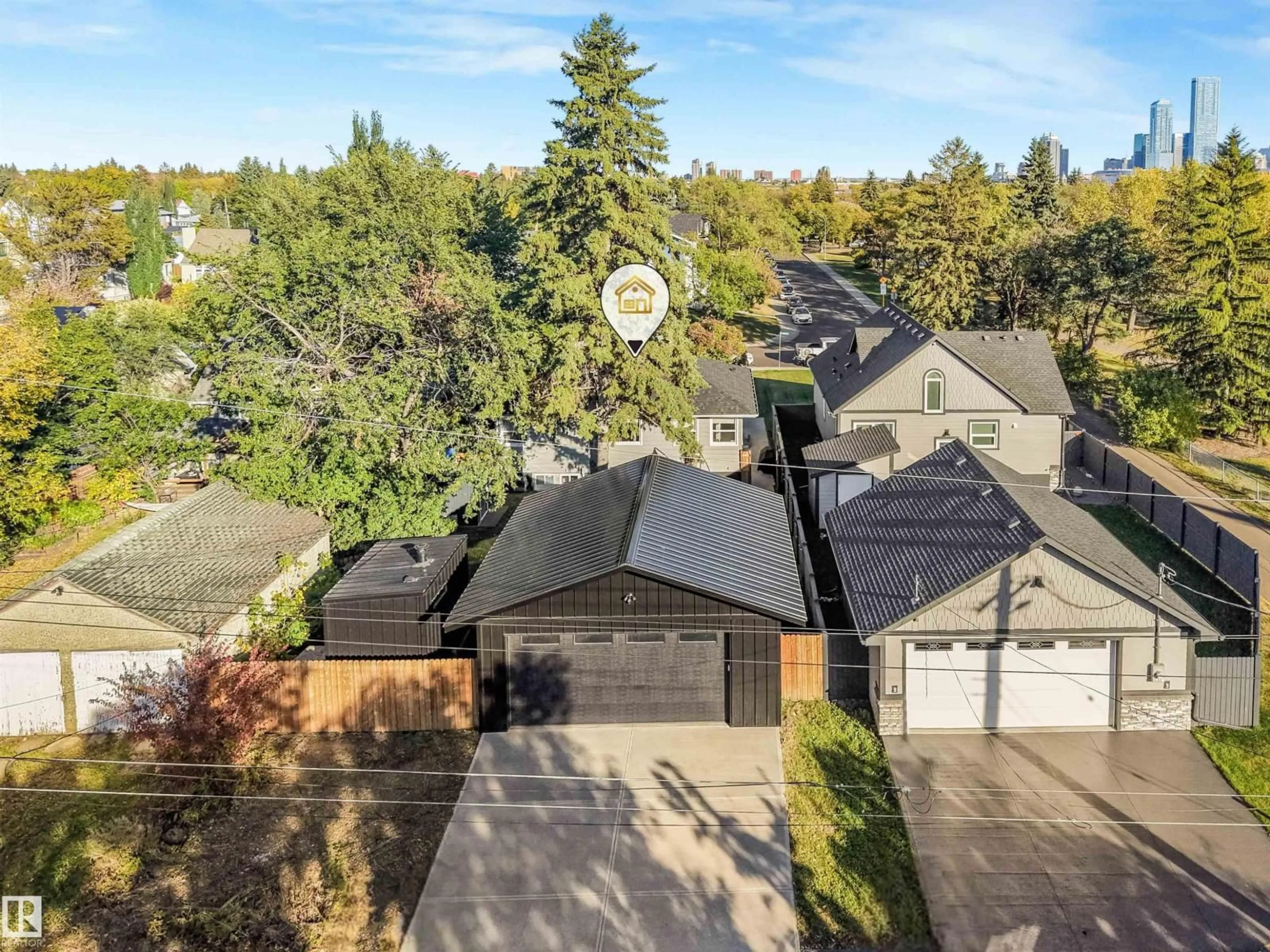 A pic from outside/outdoor area/front of a property/back of a property/a pic from drone, street for NW - 10906 118 ST, Edmonton Alberta T5H3N9