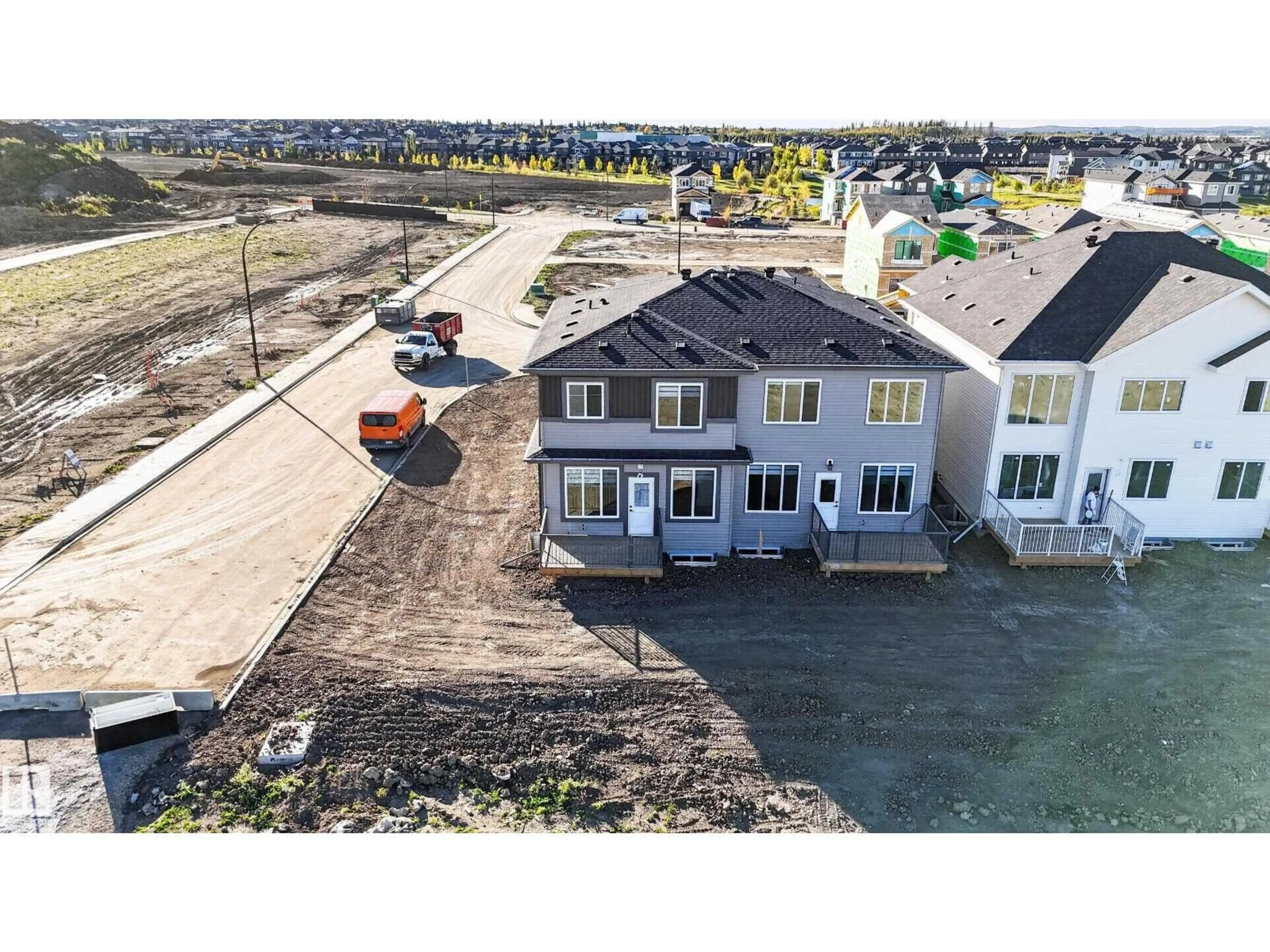 A pic from outside/outdoor area/front of a property/back of a property/a pic from drone, building for 2 PARKER LN, Spruce Grove Alberta T7X4T2