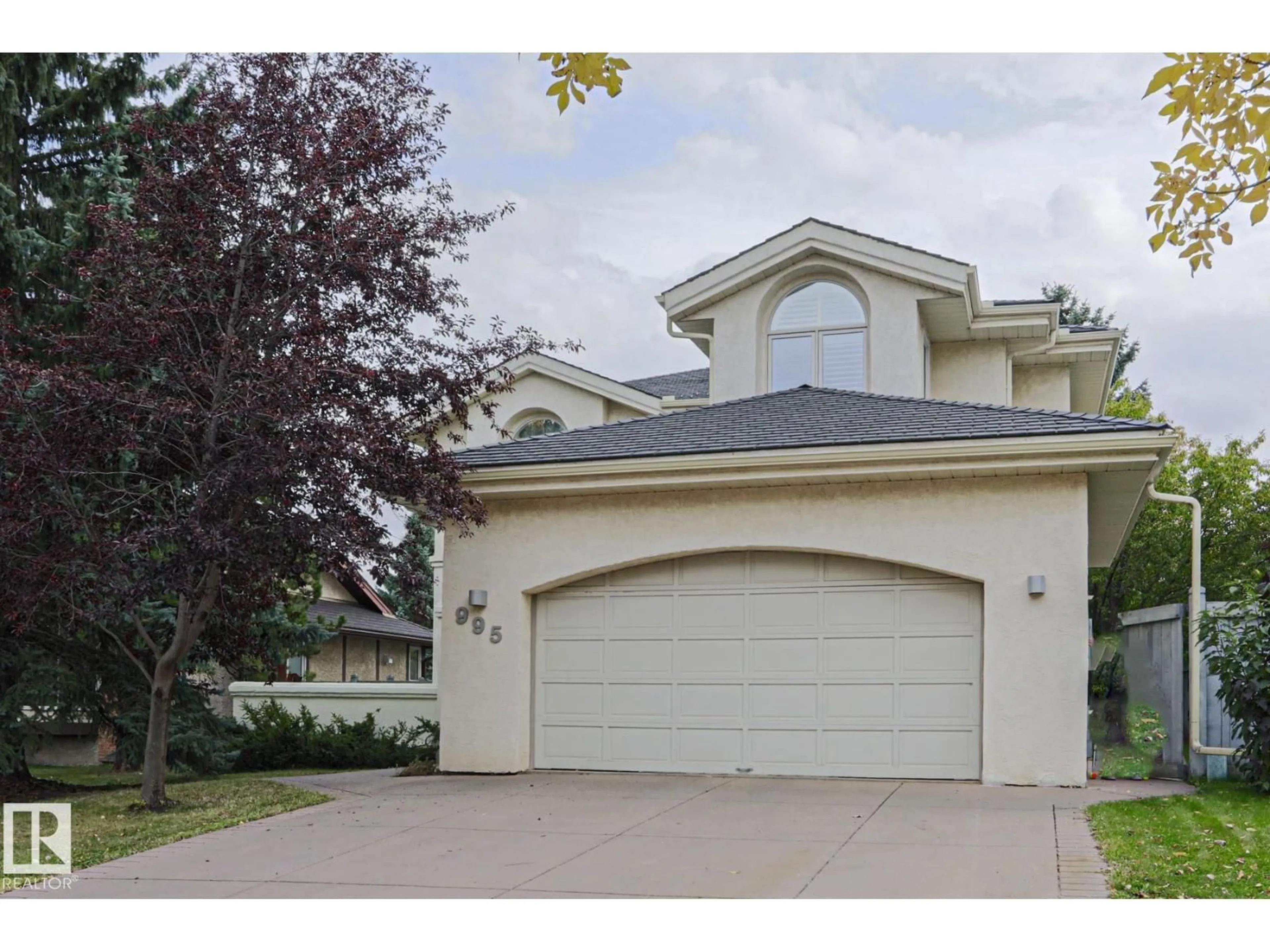 Home with vinyl exterior material, street for 995 OGILVIE BV, Edmonton Alberta T6R1K1
