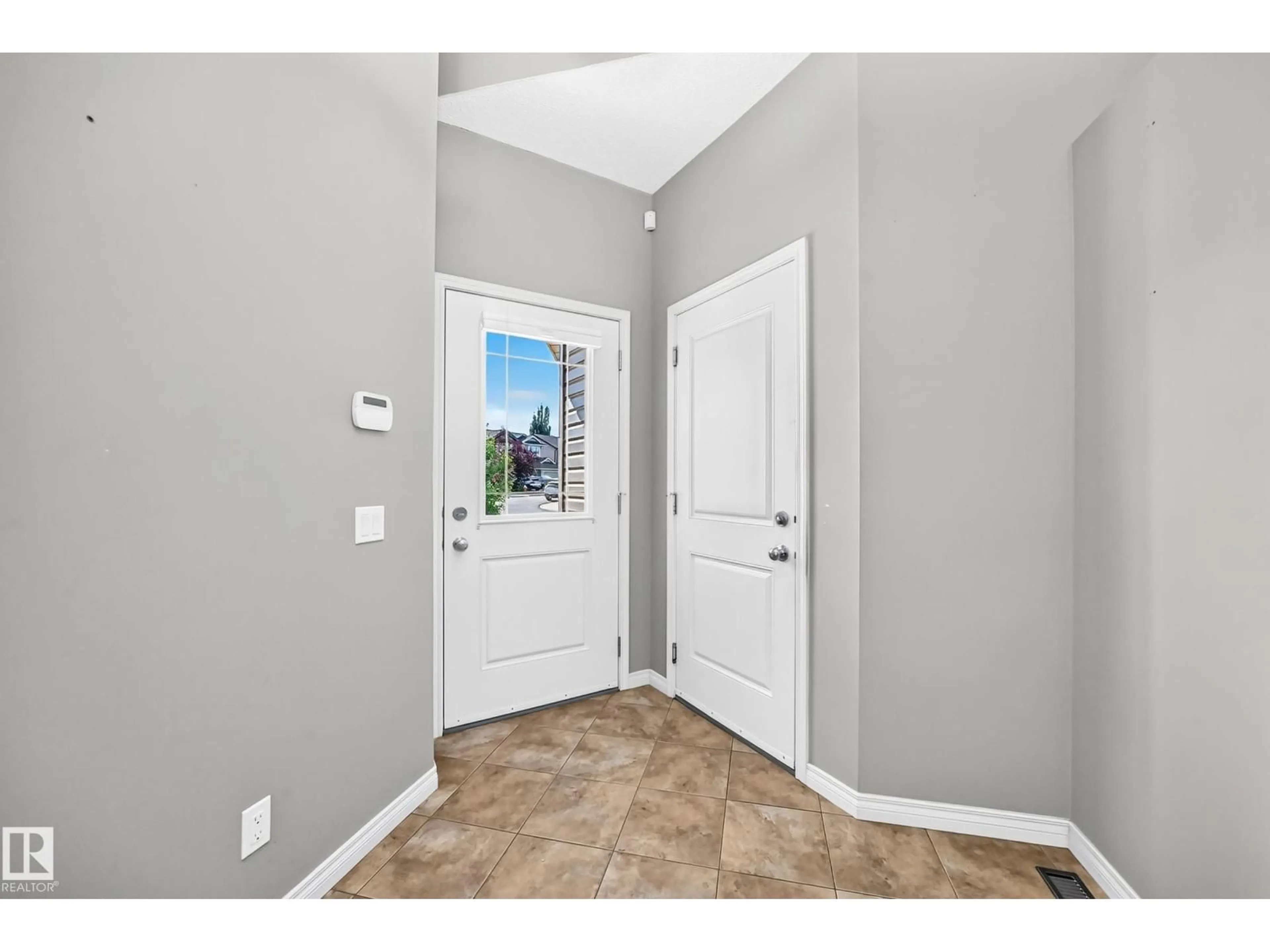 Indoor entryway for 21 SILVERSTONE DR, Stony Plain Alberta T7Z0E8